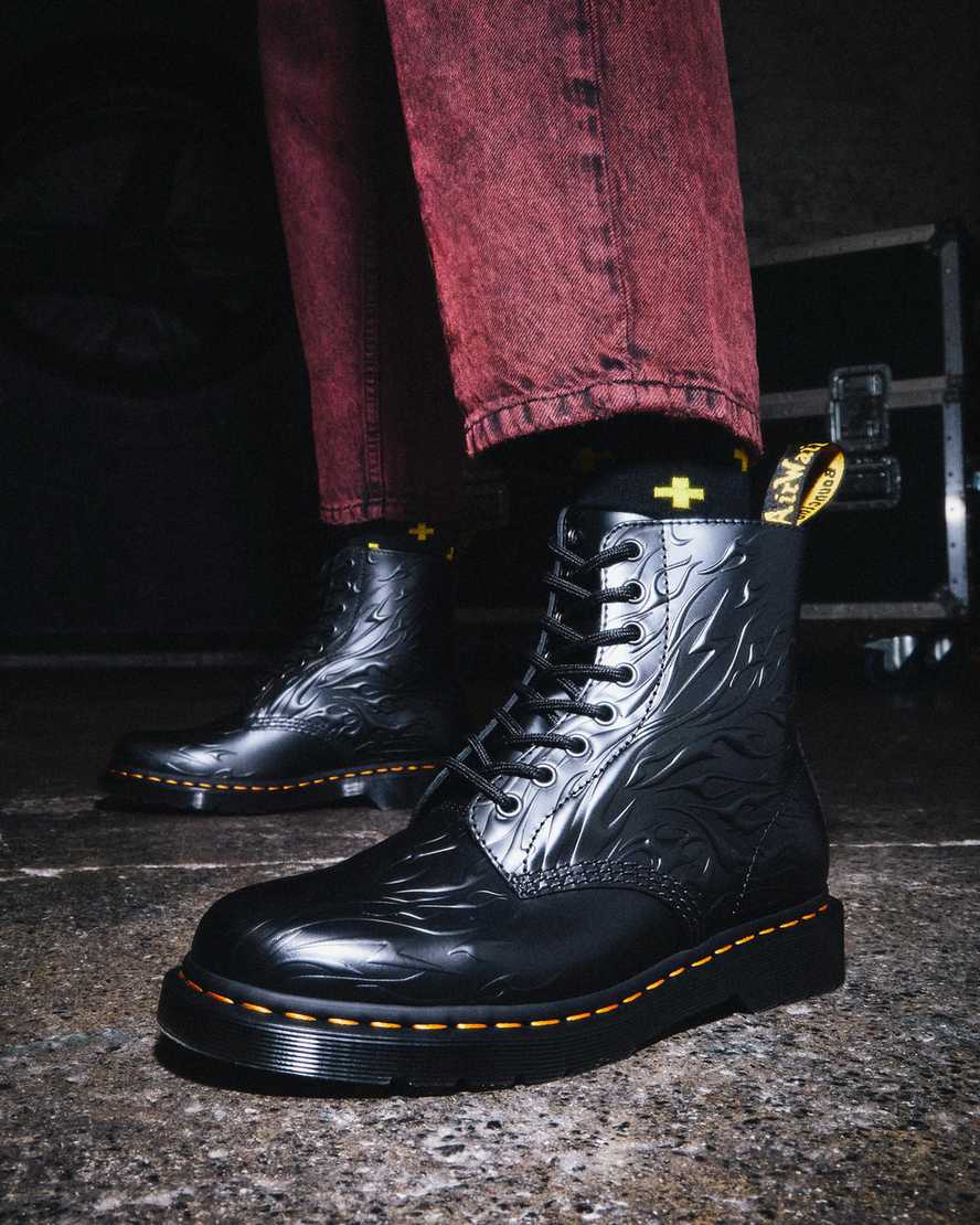 https://i1.adis.ws/i/drmartens/27028001.88.jpg?$large$1460 Flames Emboss Leather Lace Up Boots | Dr Martens