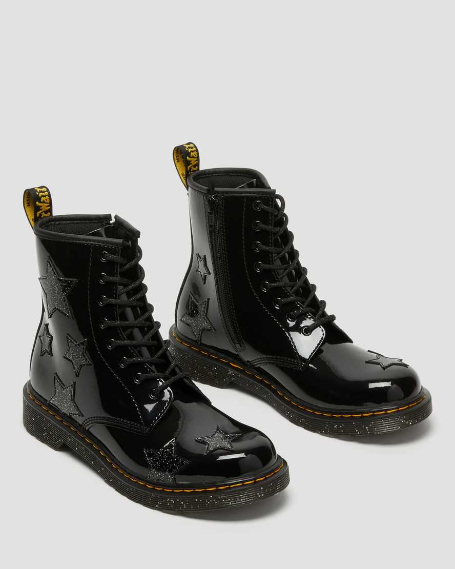 https://i1.adis.ws/i/drmartens/27060001.88.jpg?$large$Youth 1460 Glitter Star Patent Lace UpBoots | Dr Martens