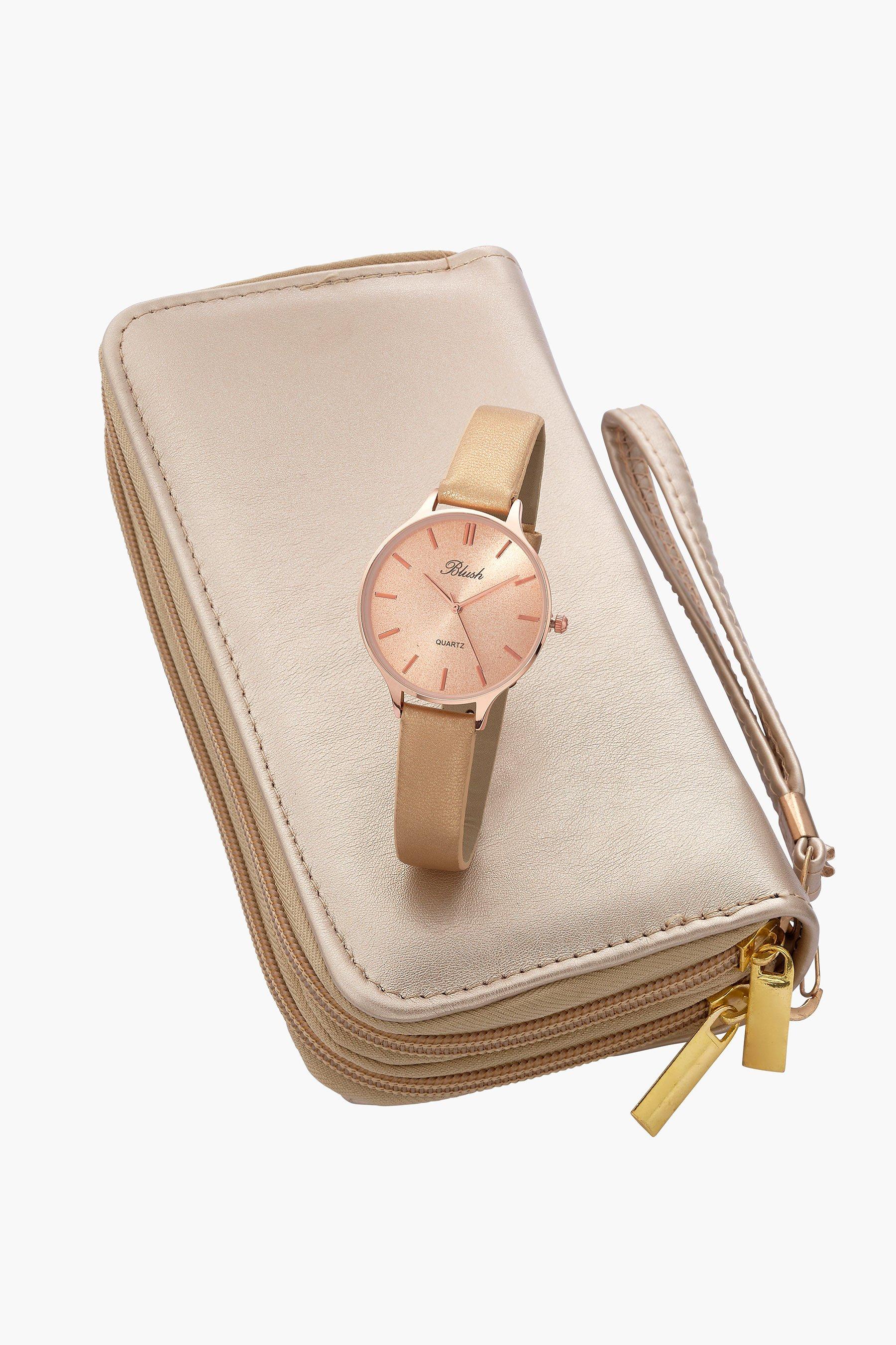 blush coloured clutch bag