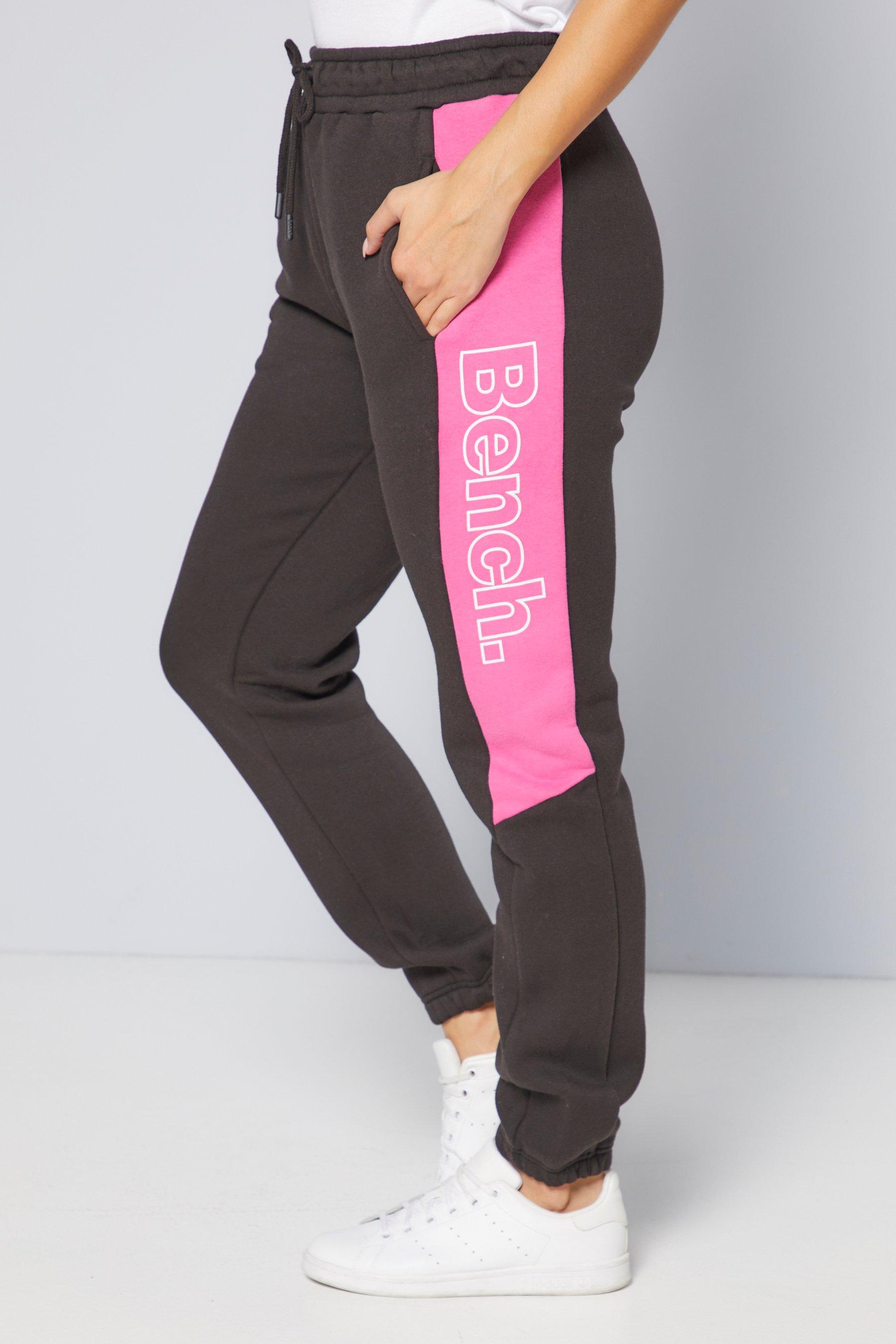 black joggers with pink stripe