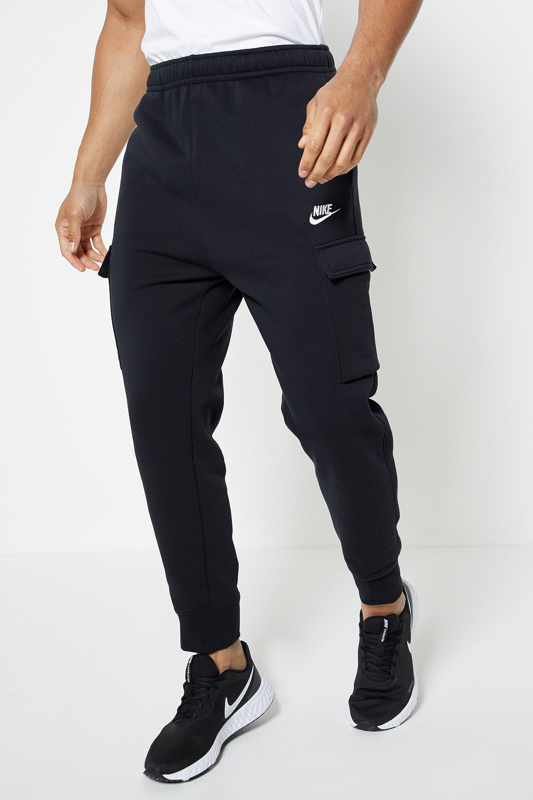 nike swoosh on tour pack cuffed cargo joggers in black