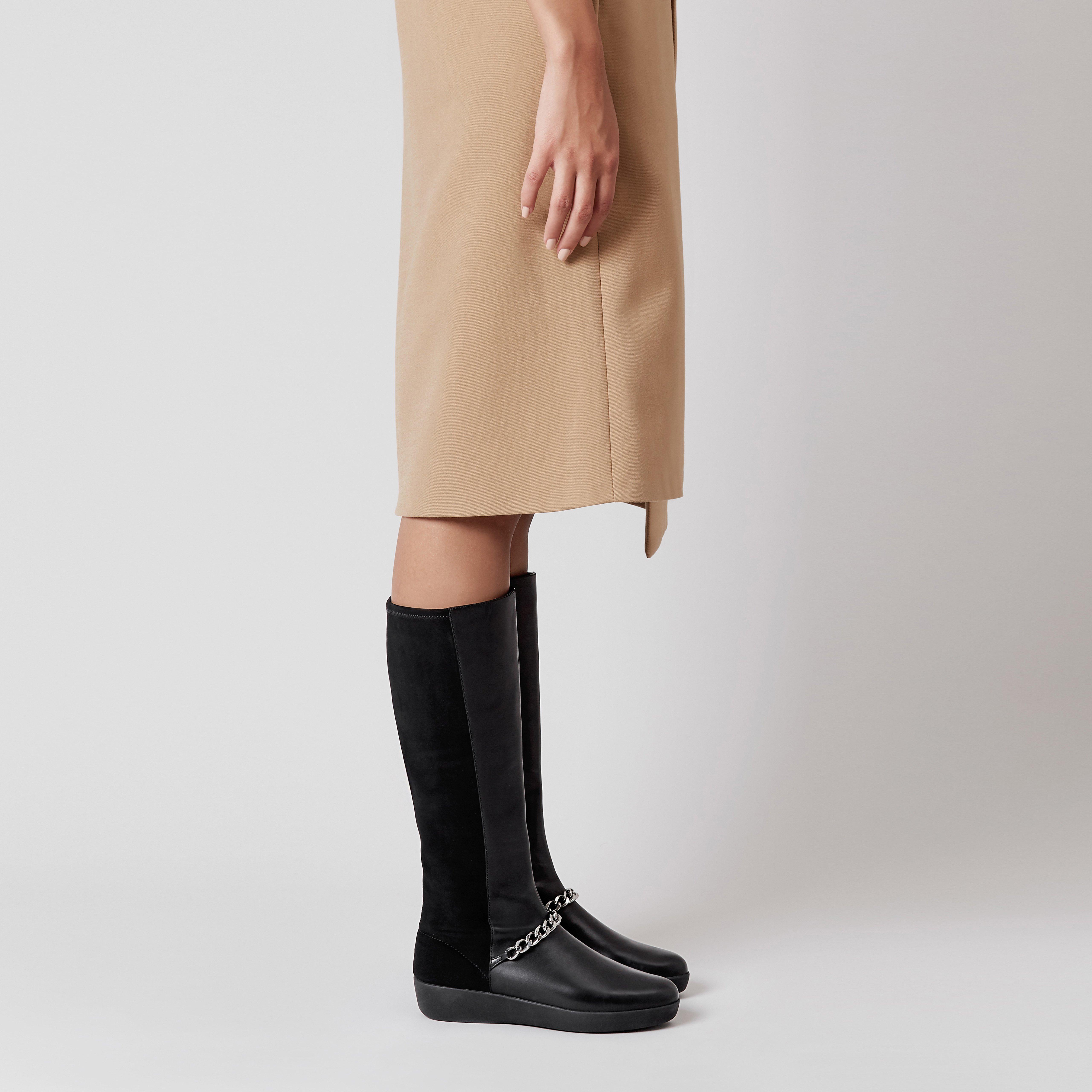 A great pair of knee boots can be one of the most versatile pieces in your winter wardrobe. These sport a shiny chain across the front and a stretch faux-suede back panel for a perfect fit. Featuring our Supercom FF midsoles for amazing all-day comfort, they'll keep your legs warm teamed with a smart dress at the office, and will look just as sophisticated dressed down at the weekends over skinny jeans.