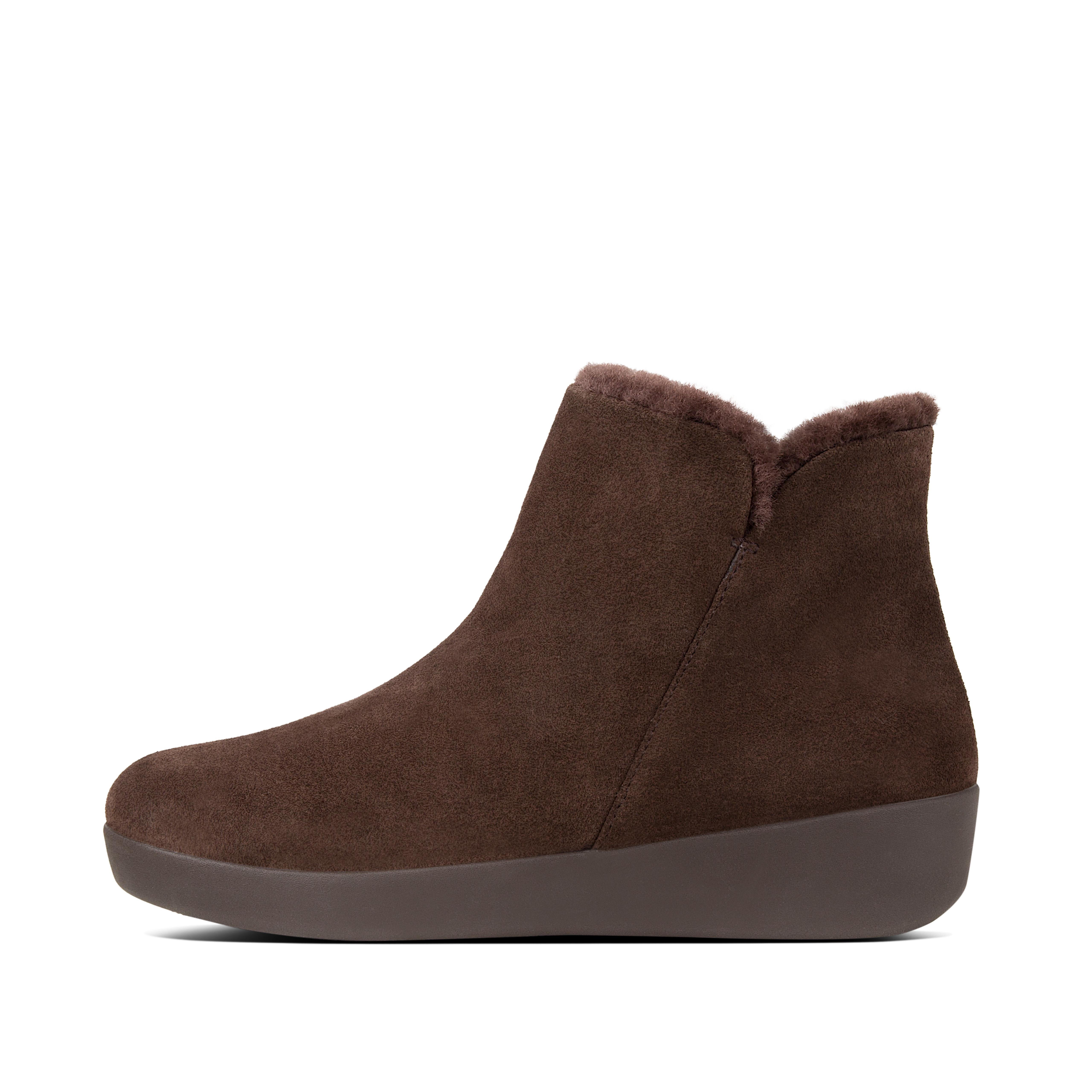 Proof that superchic can be really cosy. These sleek little zip-up ankle boots, here in suede, are lined in soft, fluffy, toasty shearling, with our Supercom FF midsoles underneath, for amazing all-day comfort and cushioning. They're versatile too - try them with a shift dress, skinny jeans or a trouser suit.