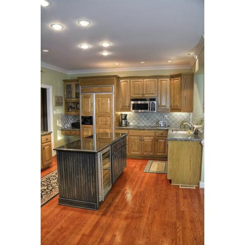 Gunstock Oak Smooth Solid Hardwood 3 4in X 2 1 4in 942749603 Floor And Decor
