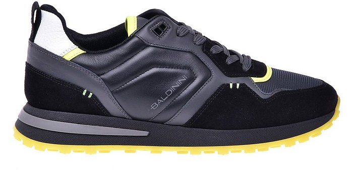 Low-top trainers in black leather and fluoresecent yellow fabric - Baldinini