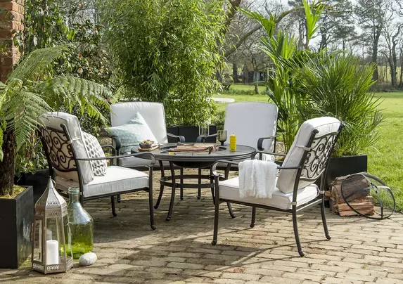 Round fire pit table with deals chairs