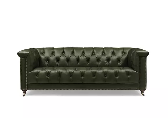 Green tufted store sofa