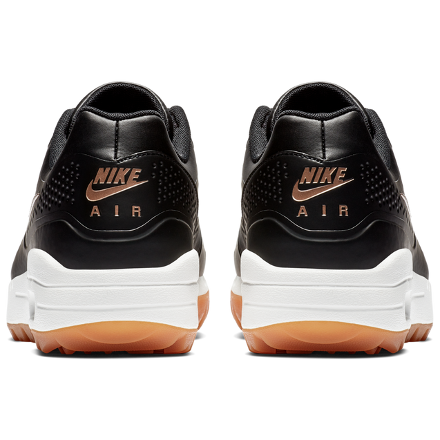 Nike rose gold store and black shoes