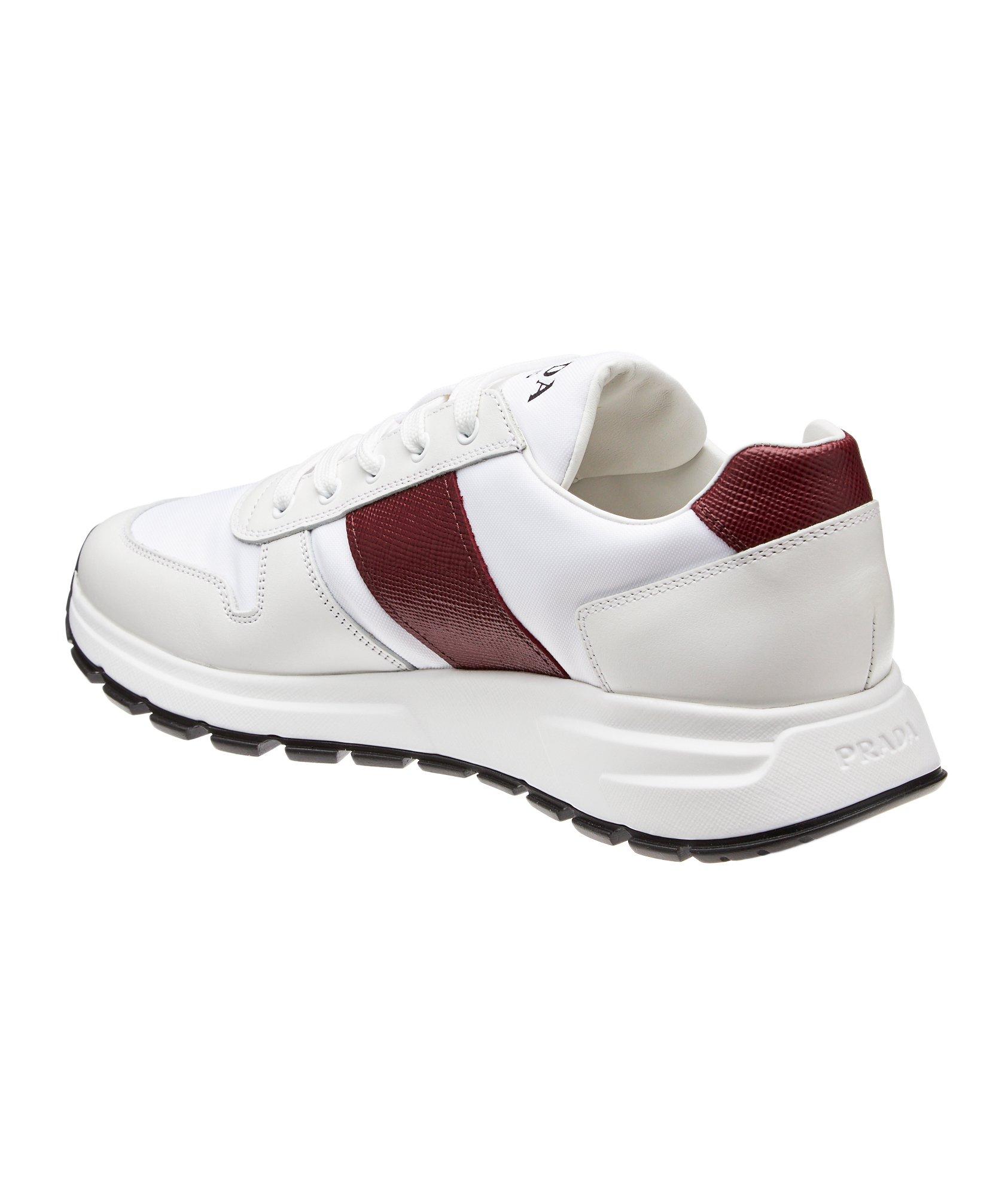 prada sneakers match race