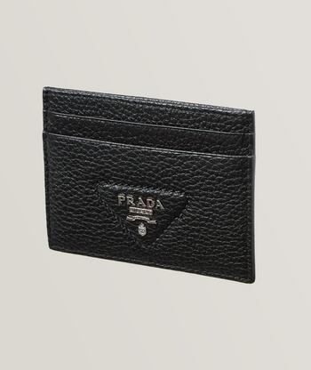 Leather-trimmed logo badge in black - Prada