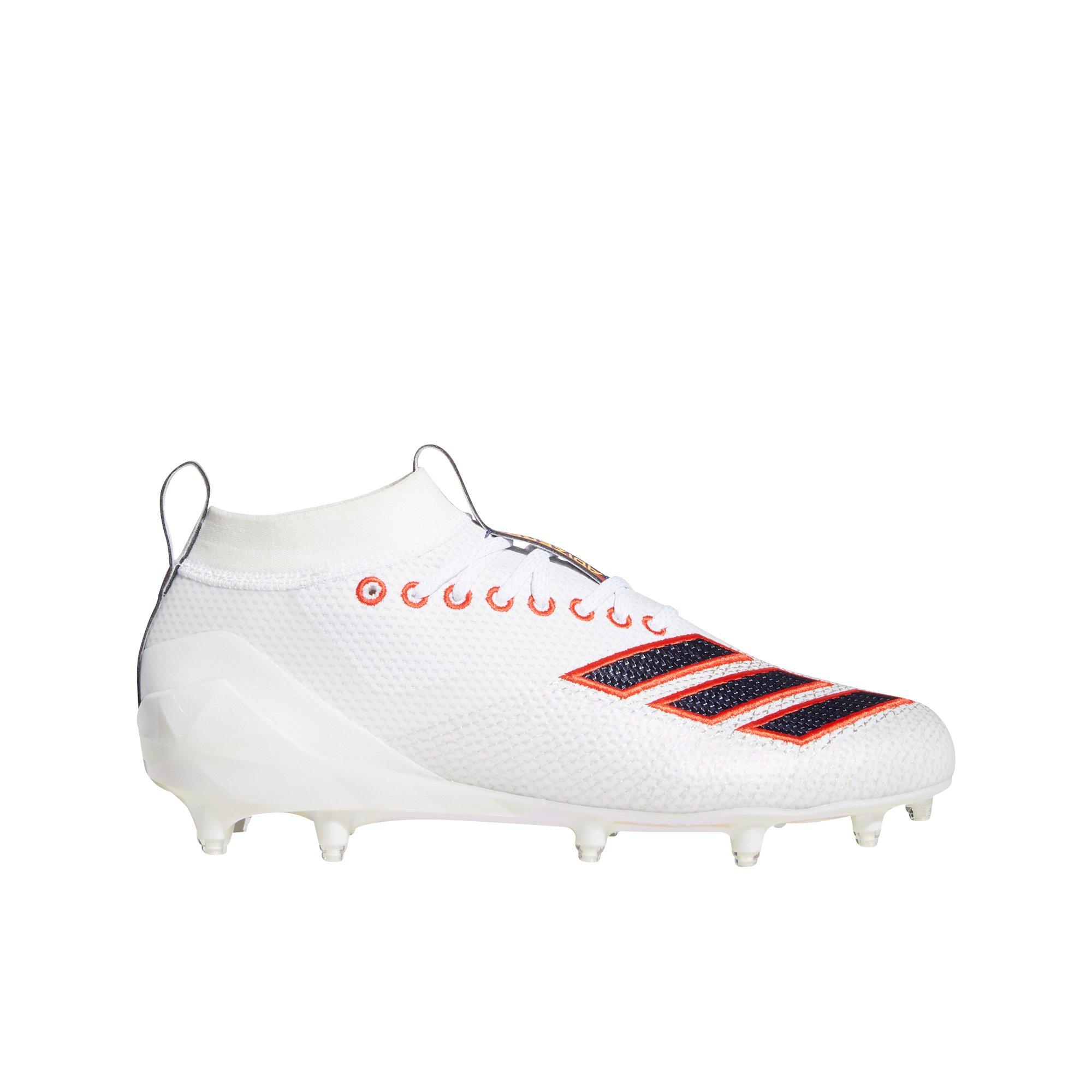 white and red adidas cleats