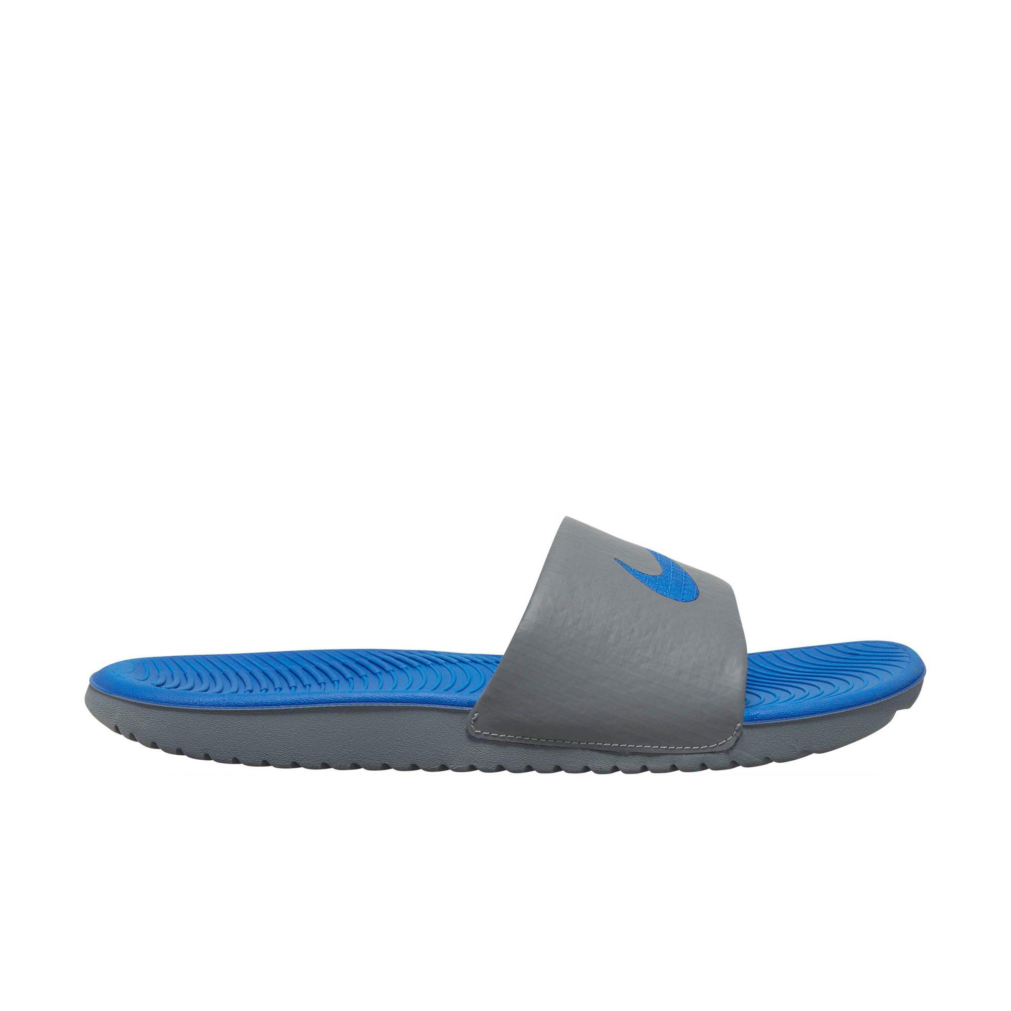 blue and grey nike slides