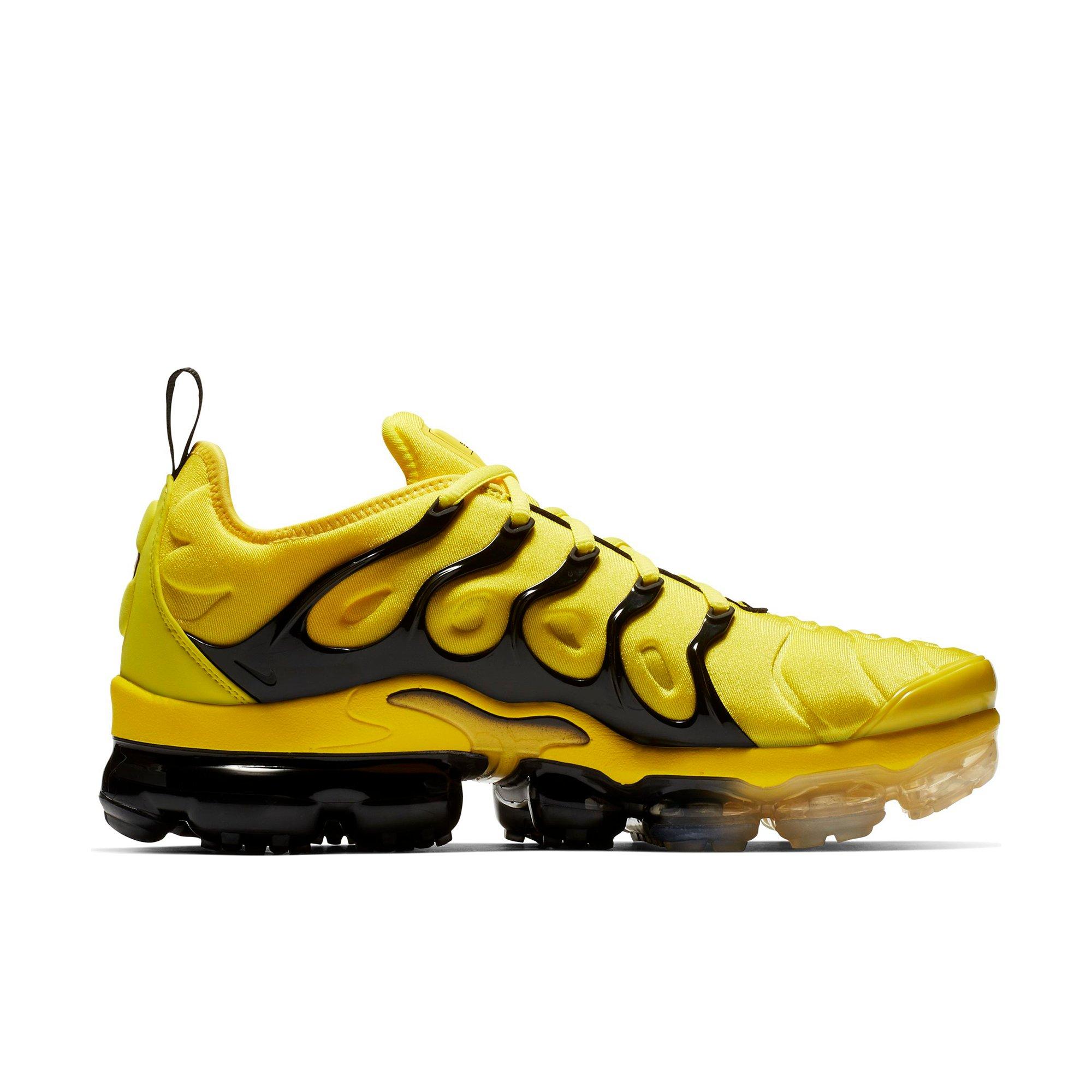 yellow and black vapormax