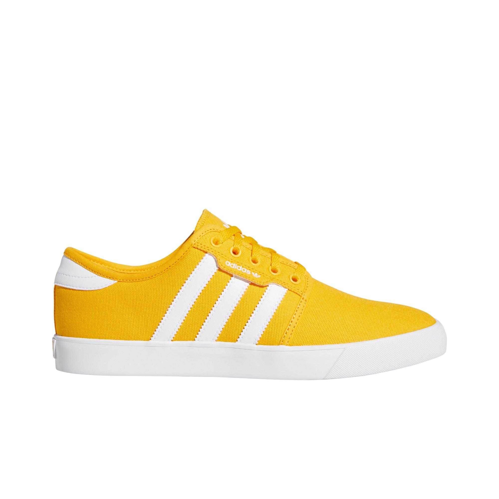 yellow and white adidas