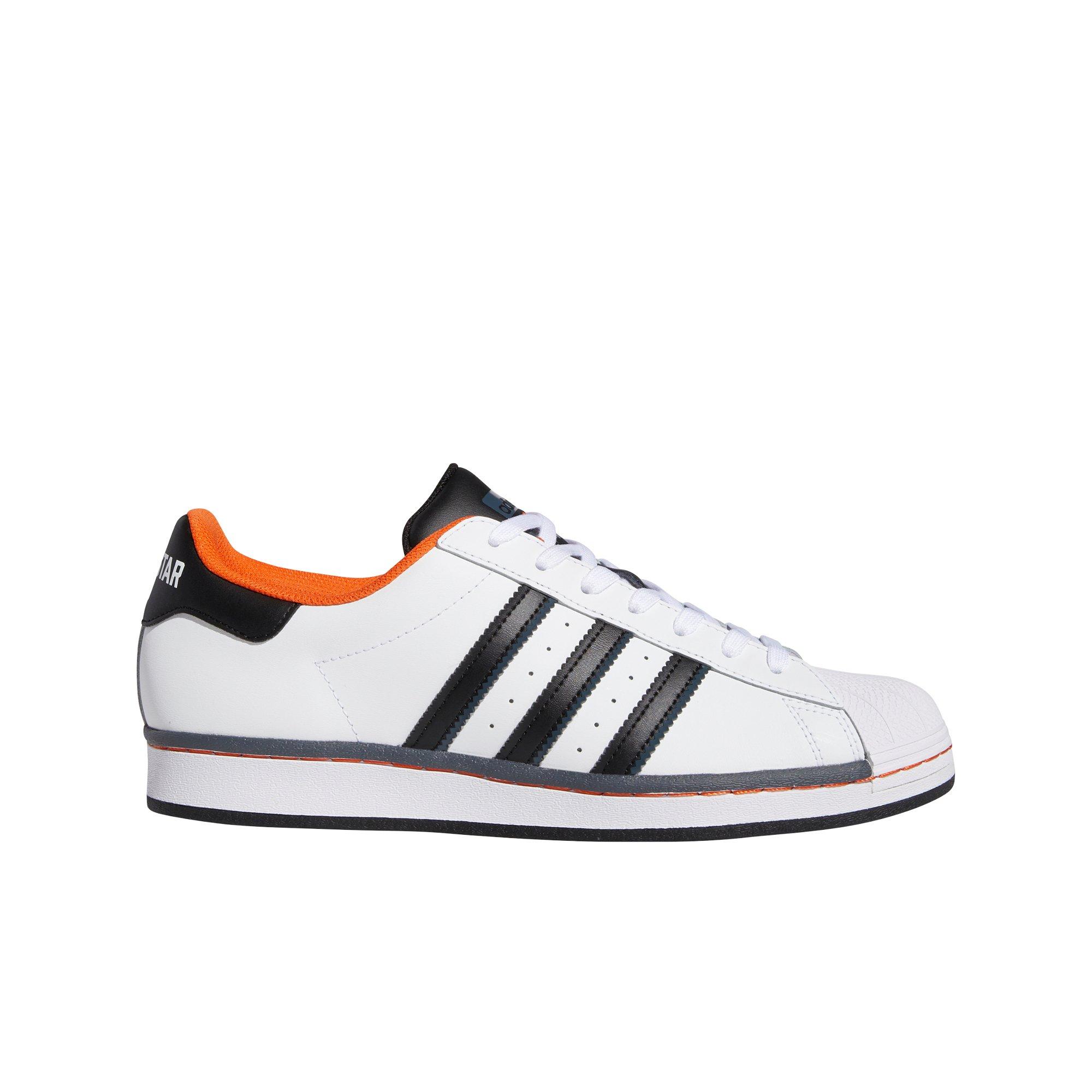 orange and white shell toe adidas