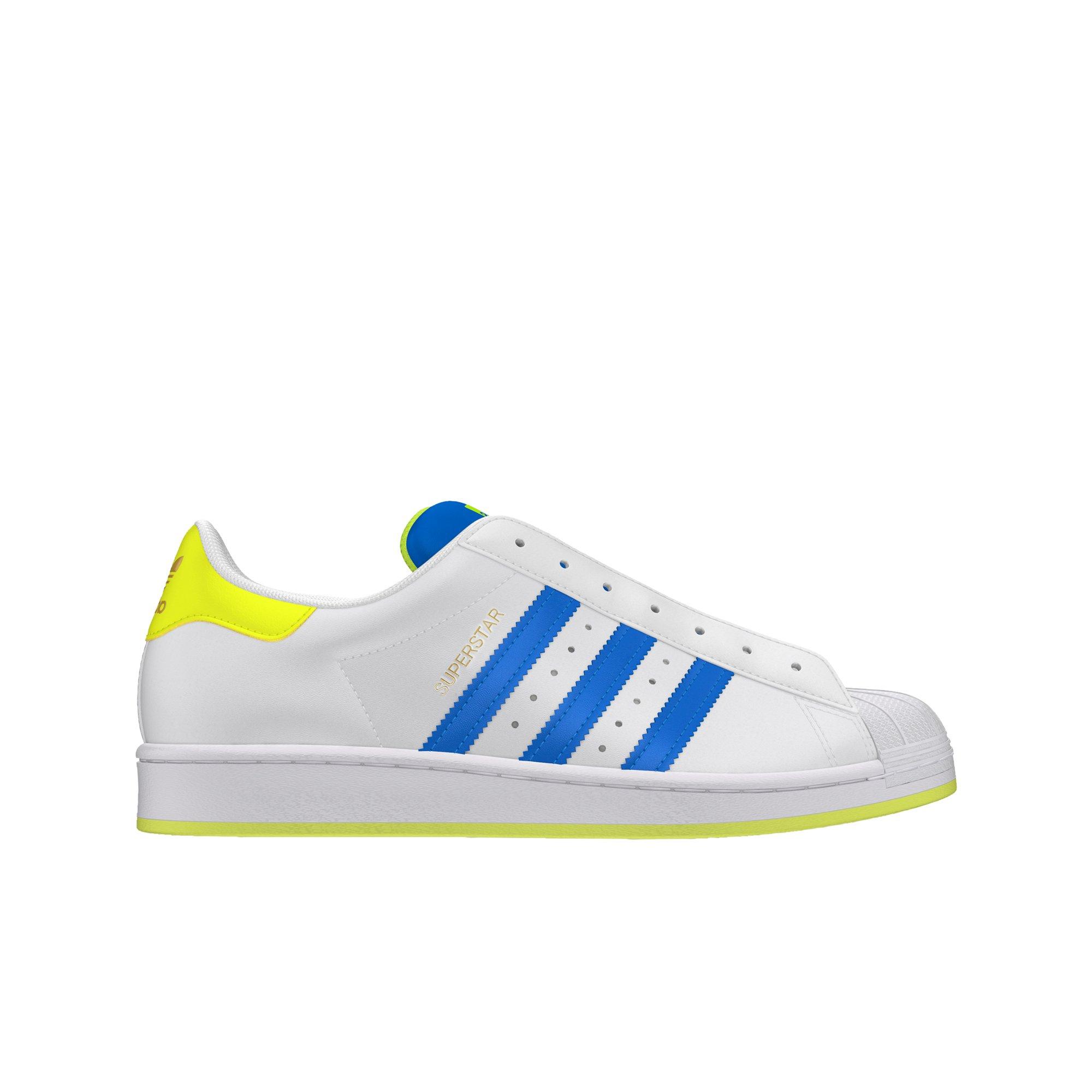 white and yellow adidas superstar