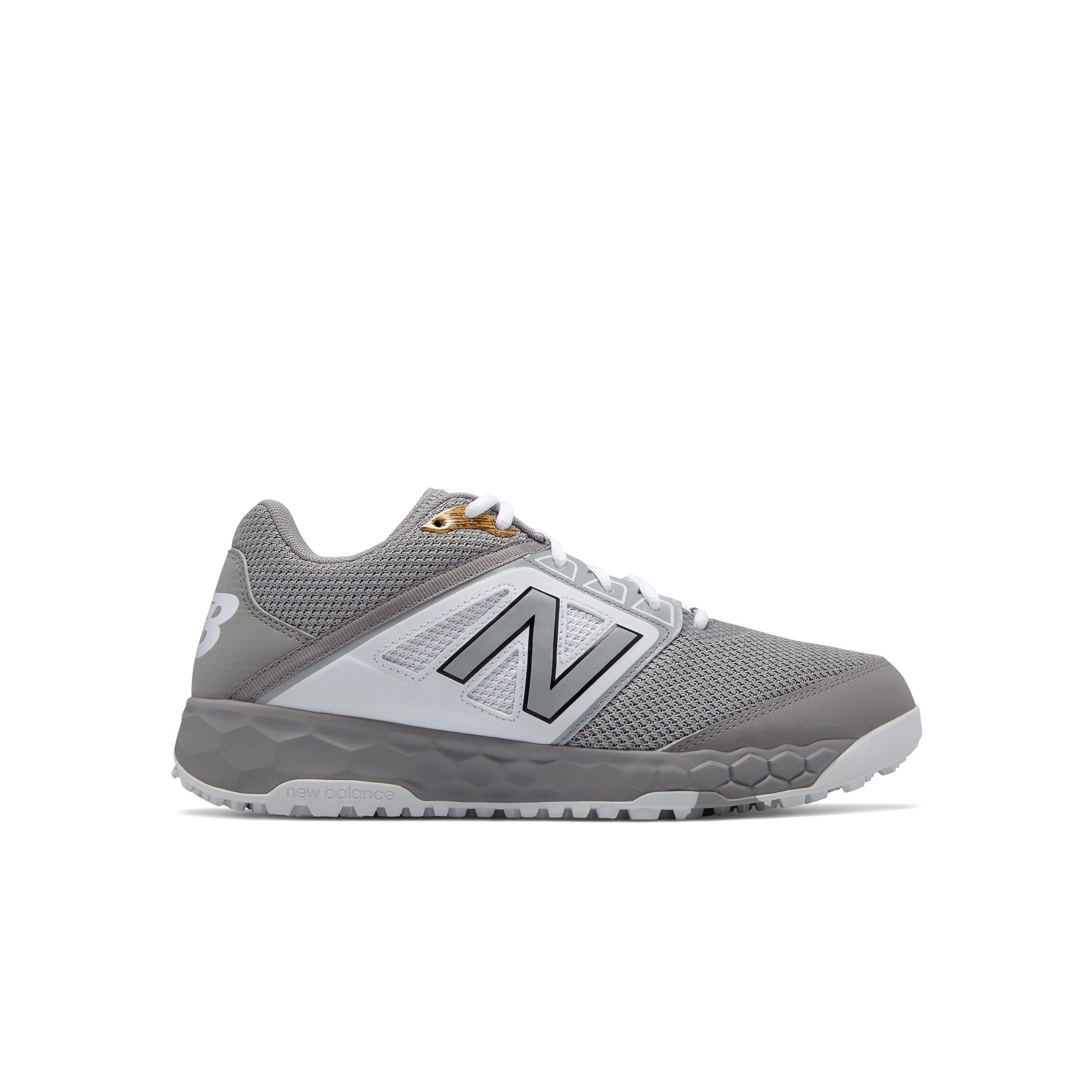 kids new balance turf shoes