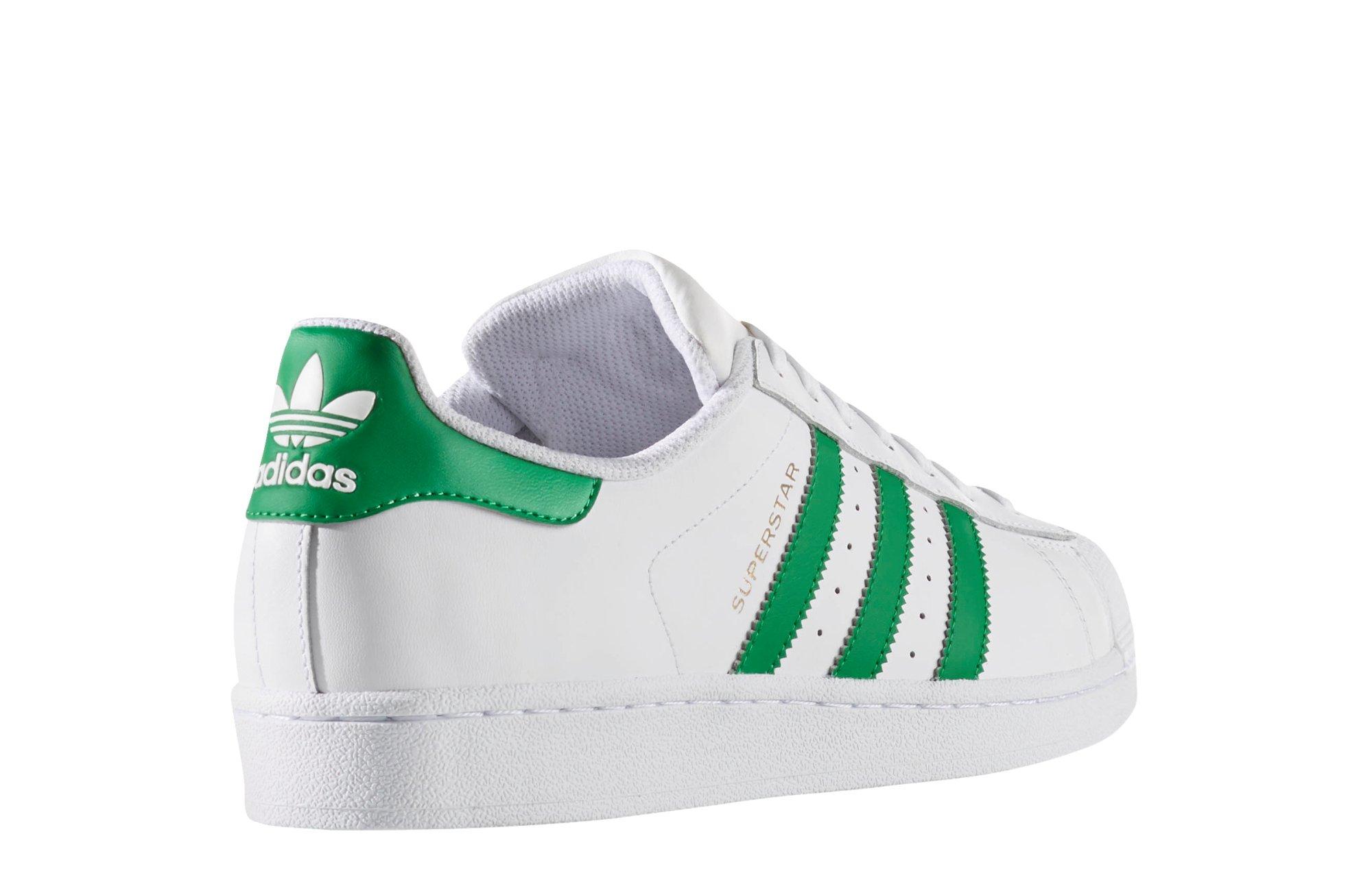 white adidas shoes with green back