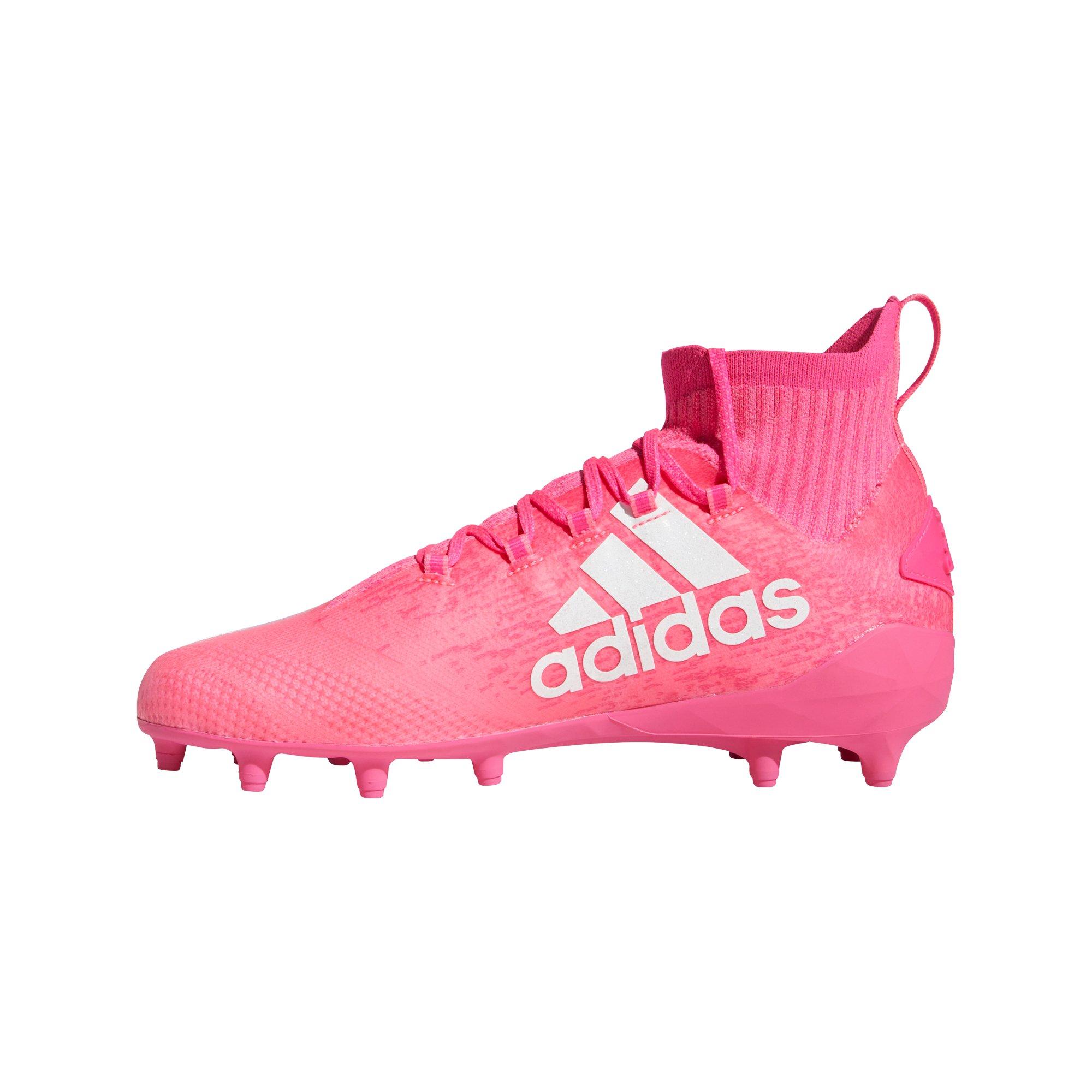 pink and white football cleats