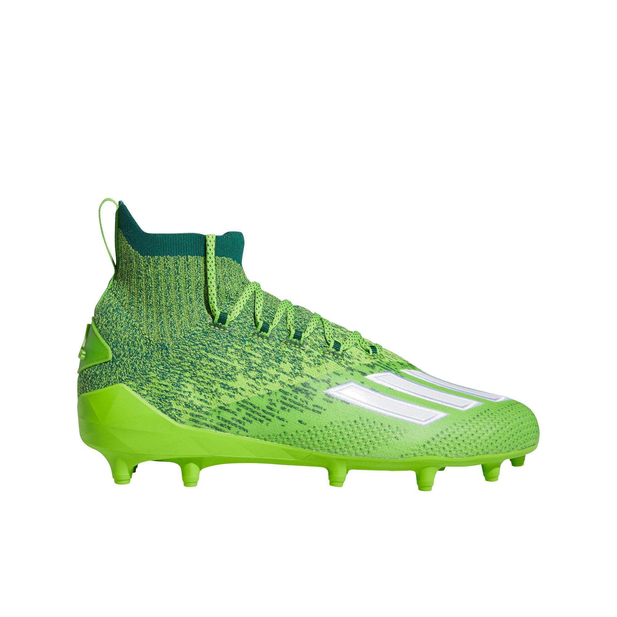 football cleats green