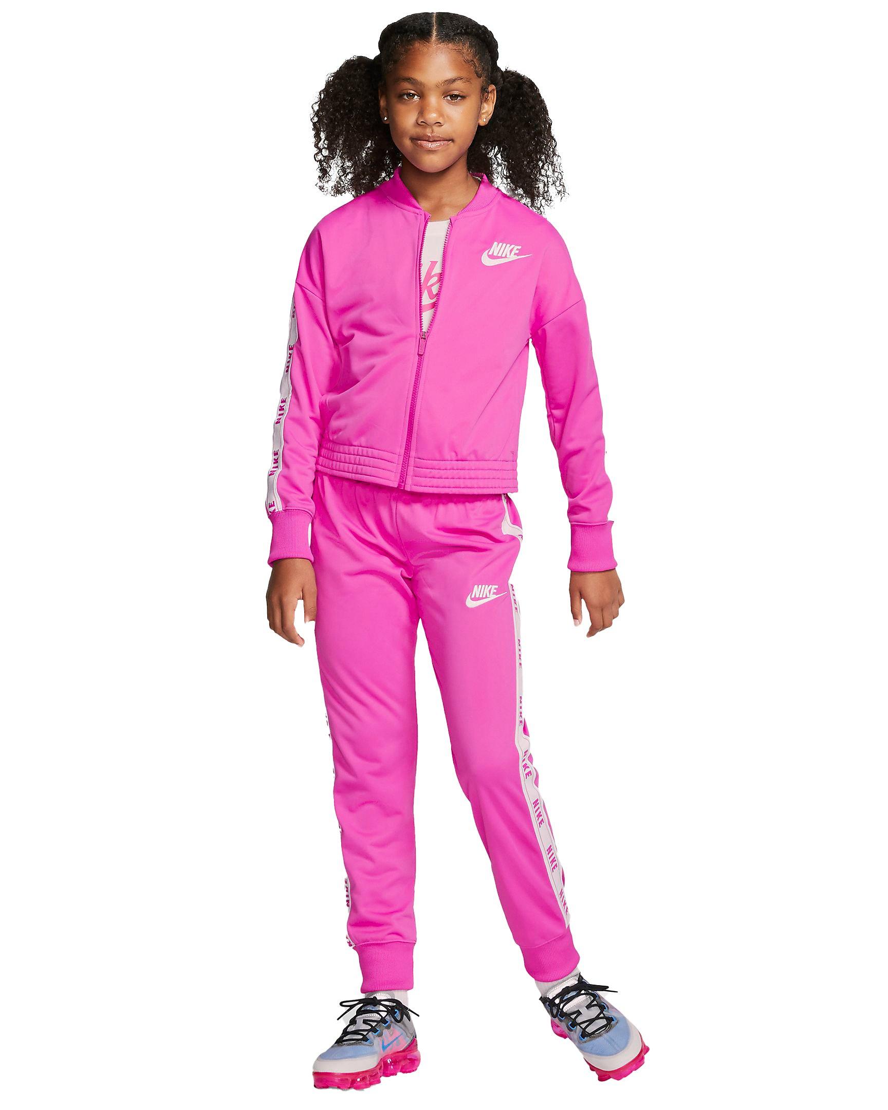 pink and white nike tracksuit