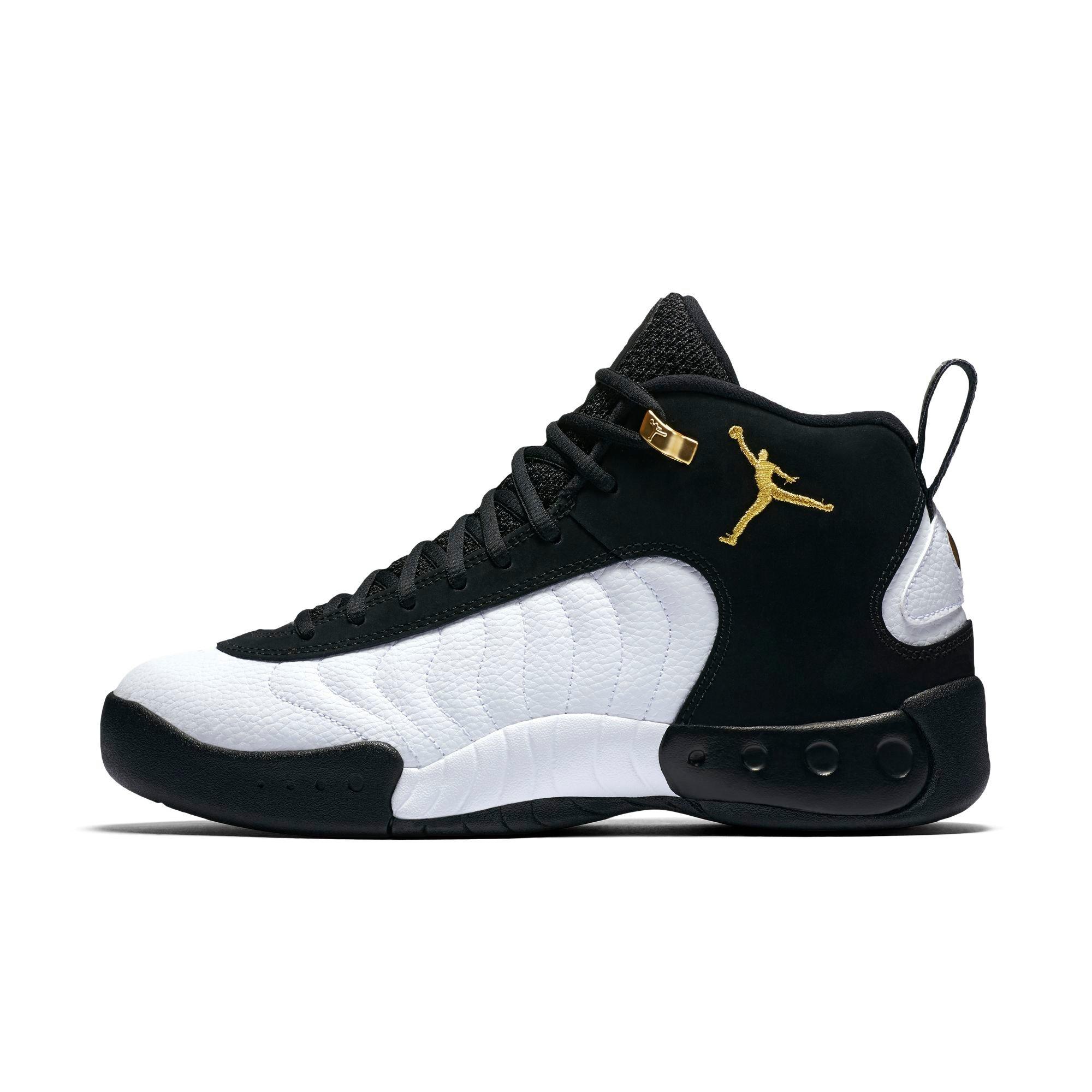 gold and black and white jordans