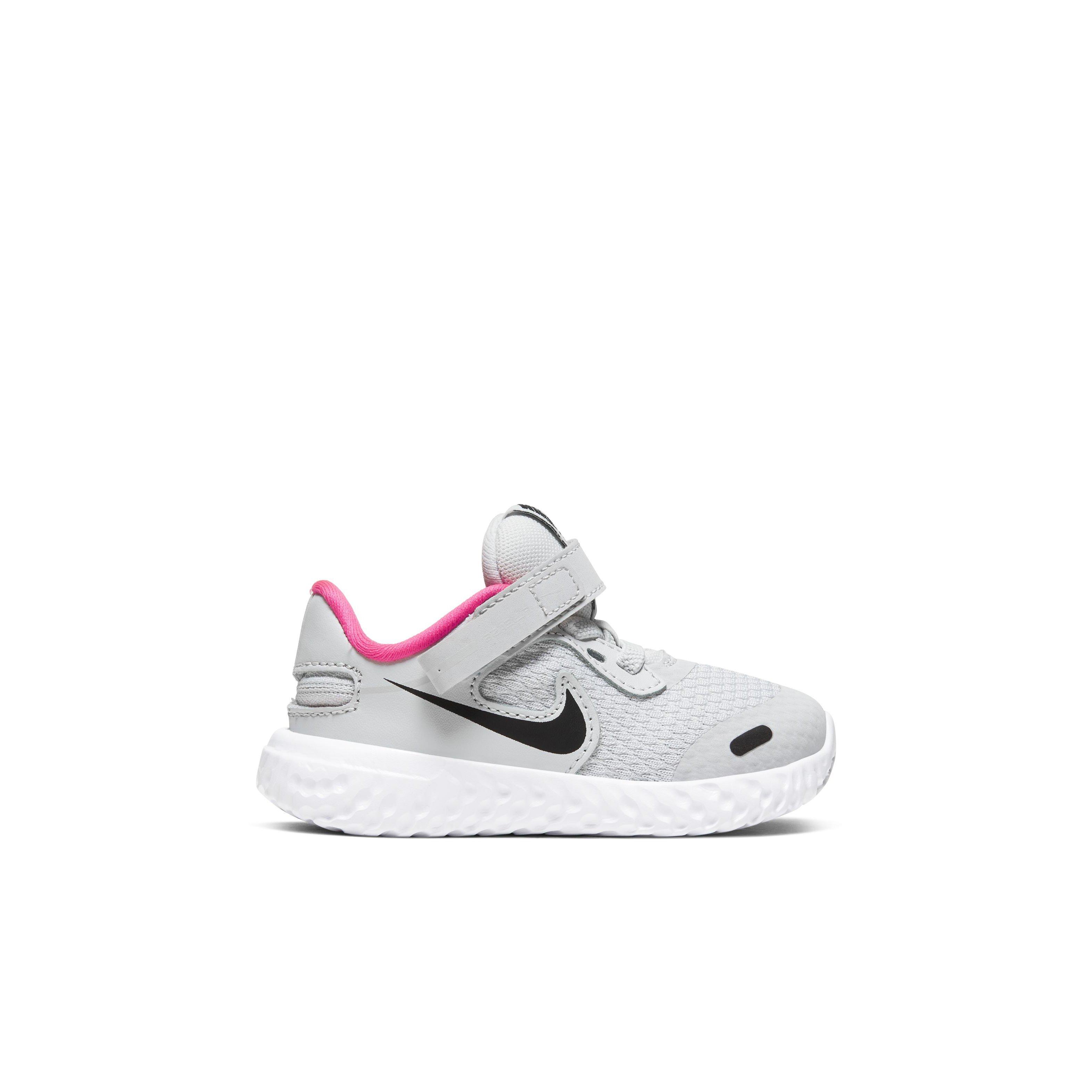 nike revolution pink and black