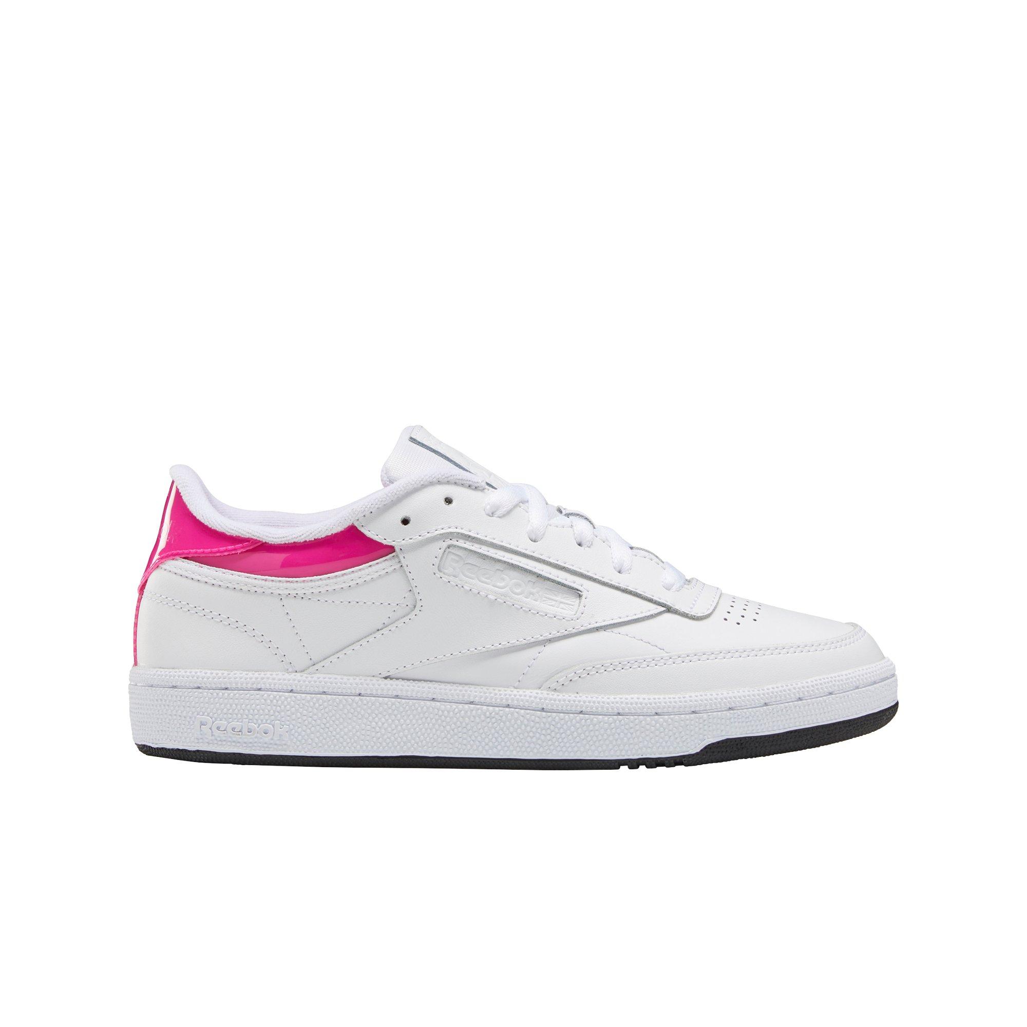 white and pink reebok