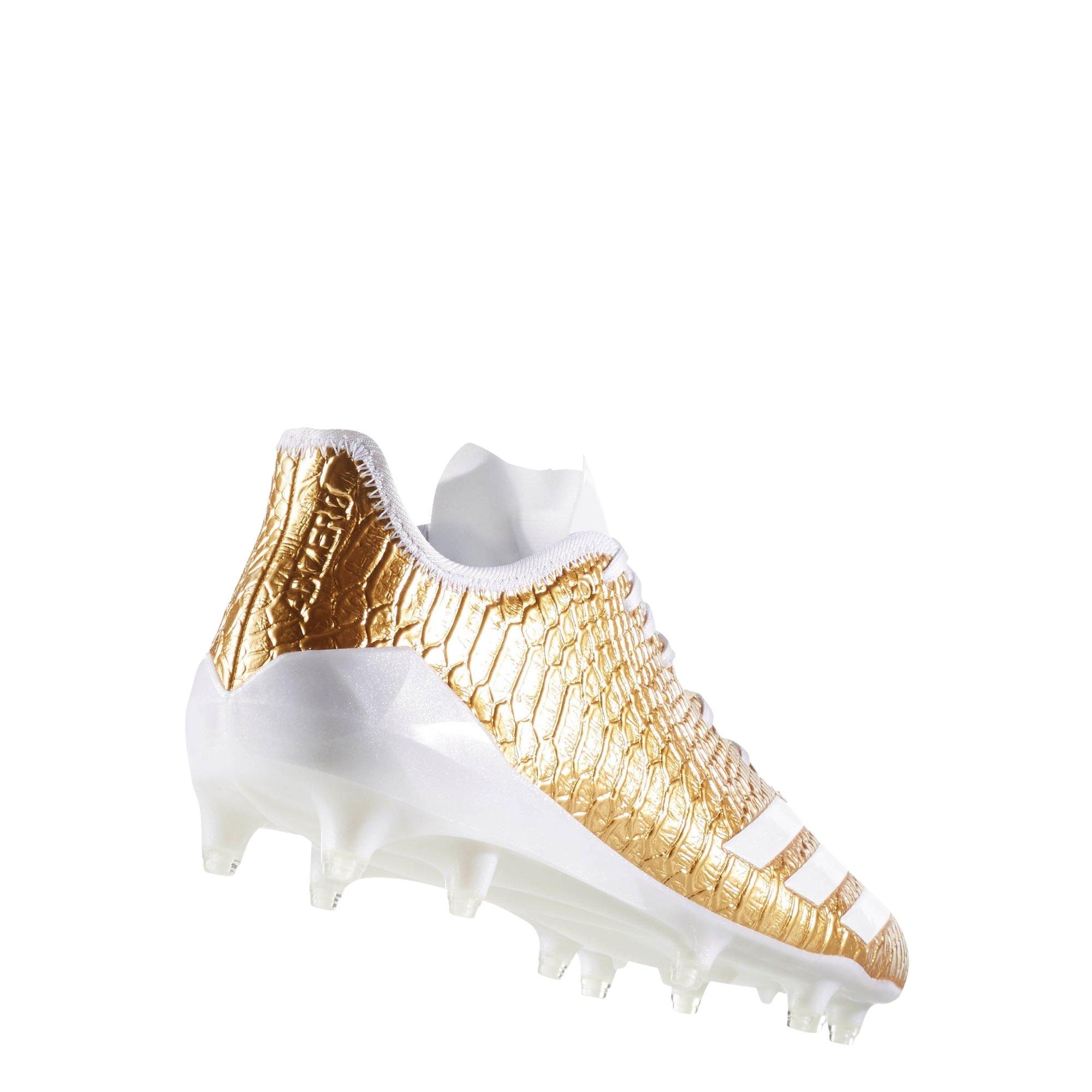 gold and white adidas football cleats