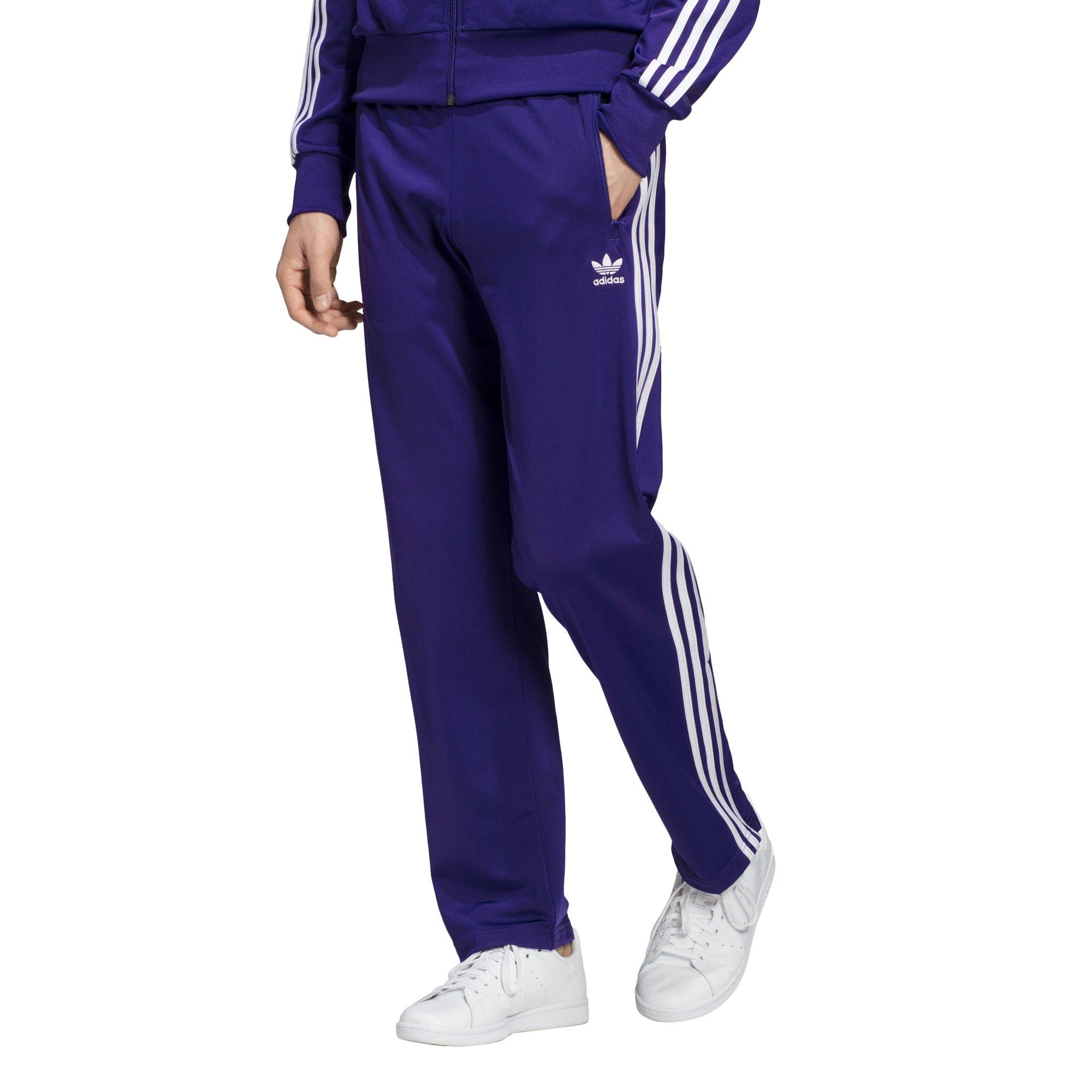 purple adidas track pants