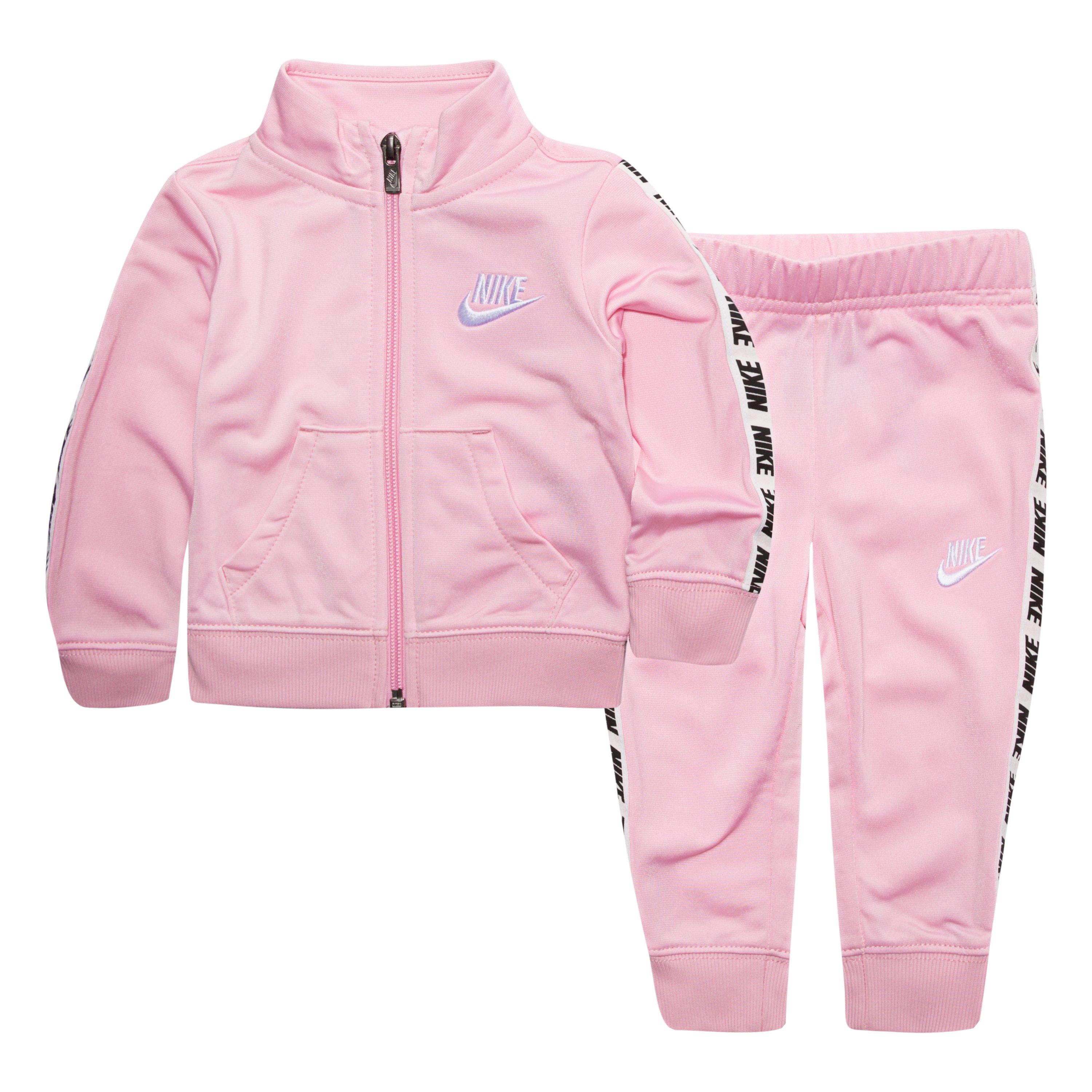 pink nike tape tracksuit