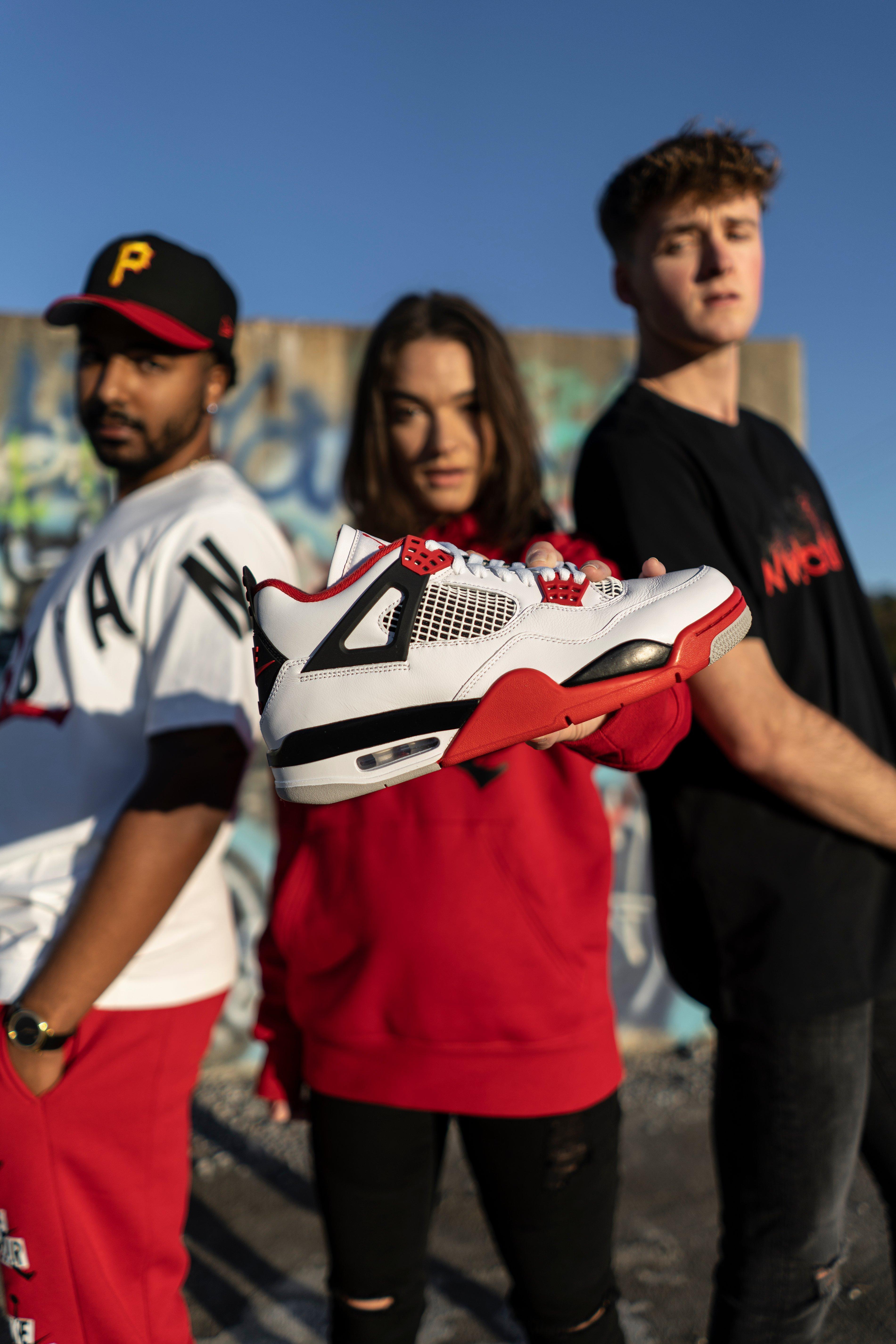 jordan 4 fire red with jeans