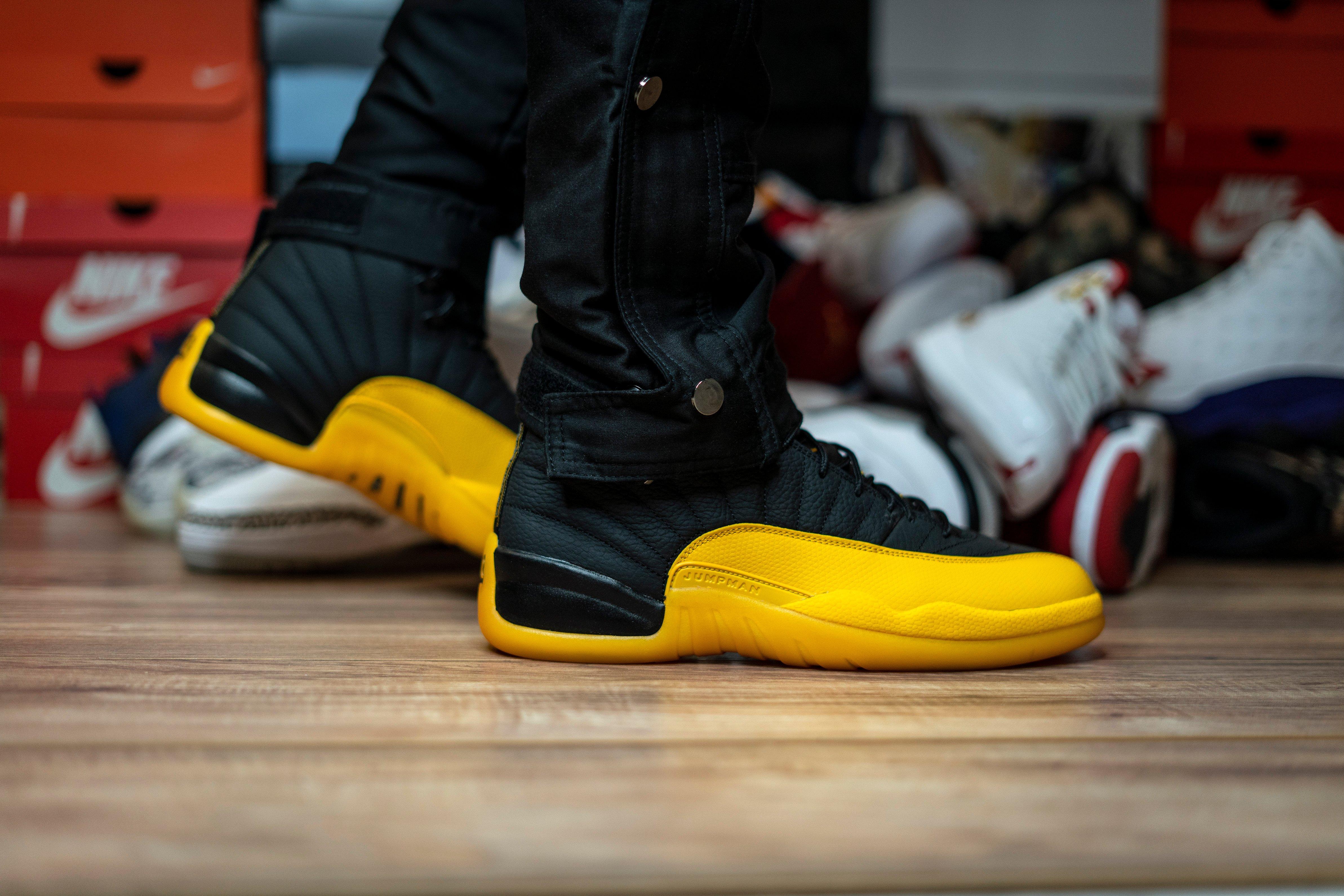 jordan 12 university gold on feet