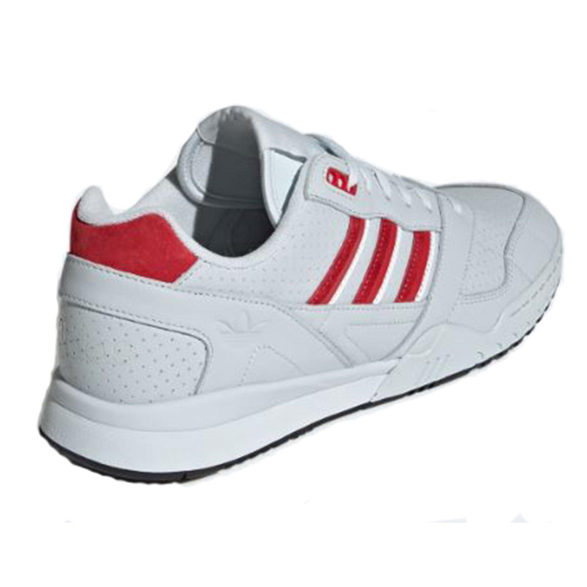 red and white adidas trainers