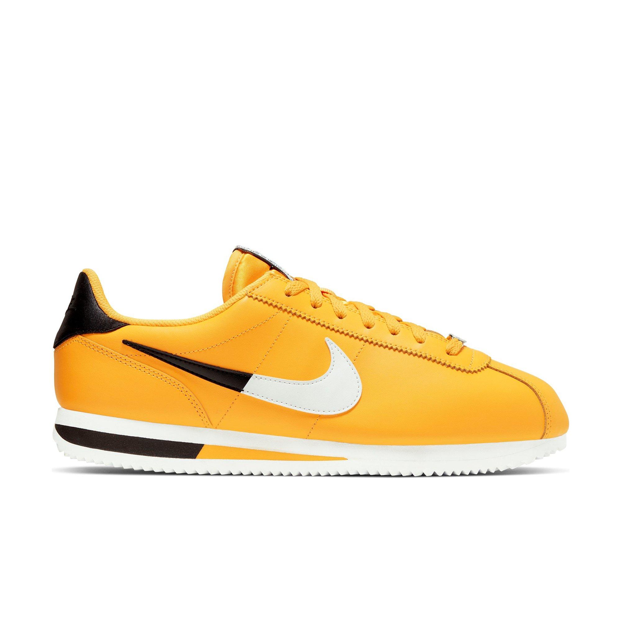 nike cortez yellow and black