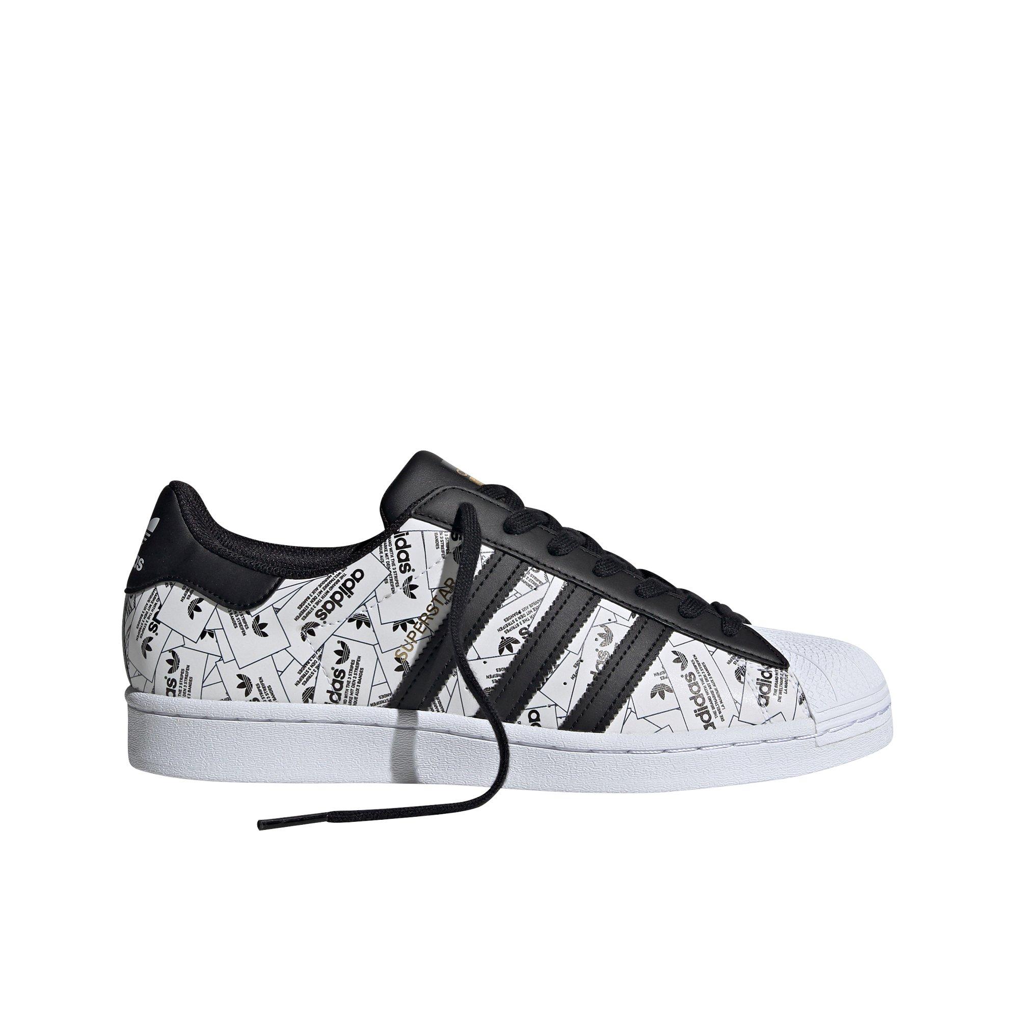 black and white adidas superstar high top