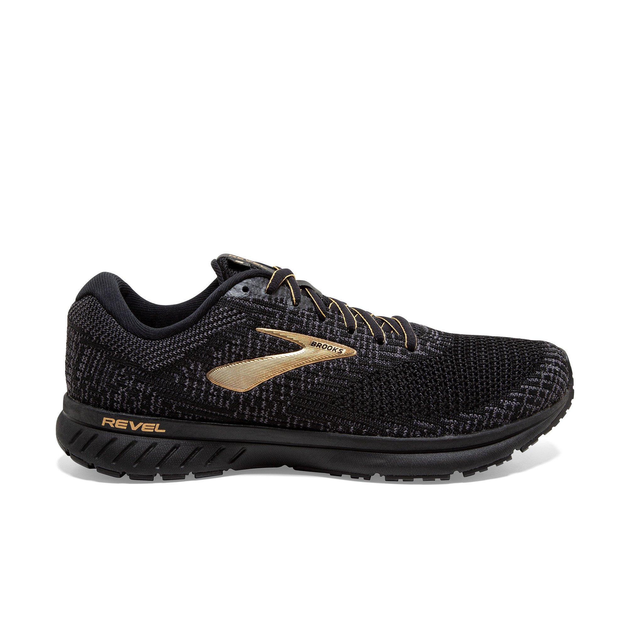 gold and black running shoes