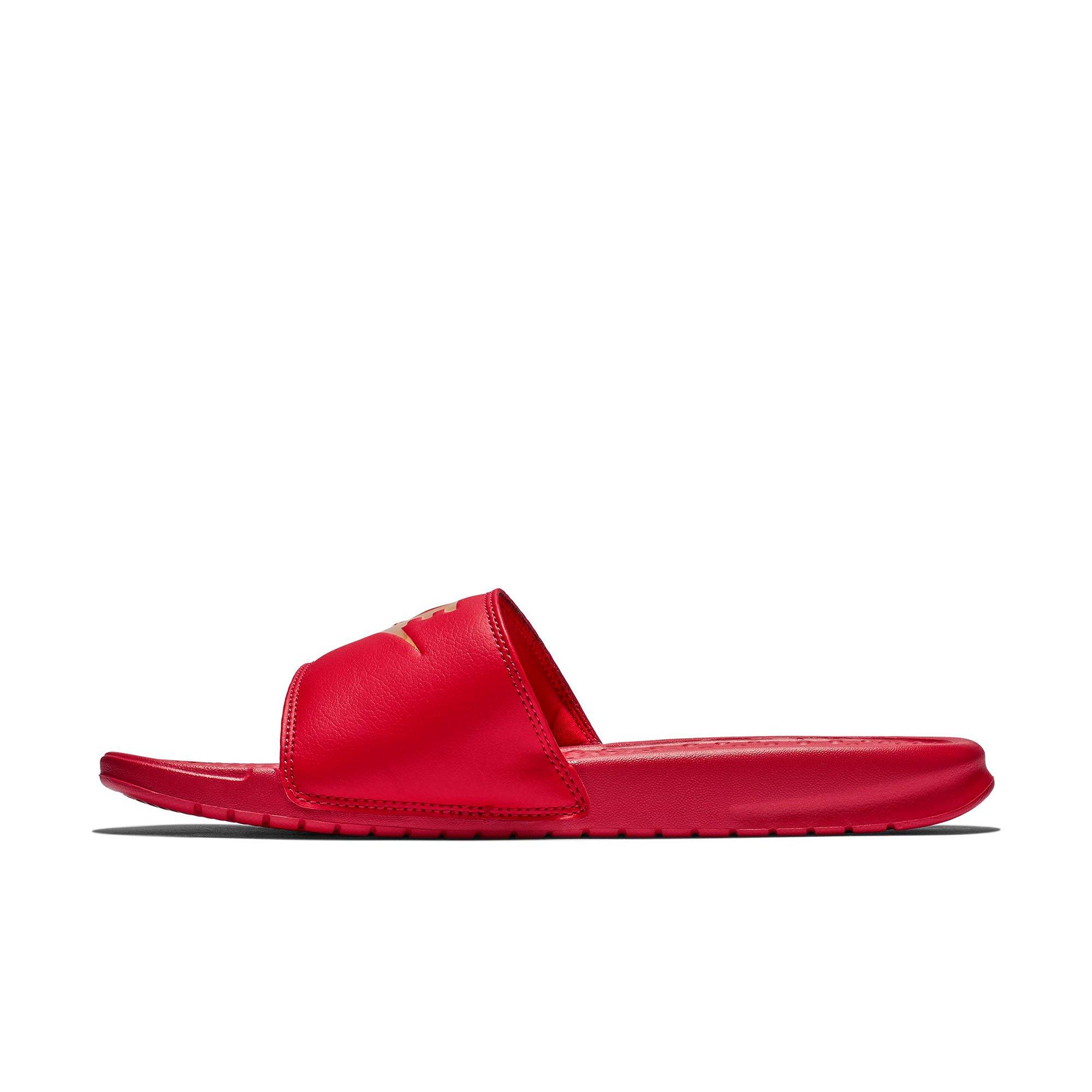 red and gold nike flip flops