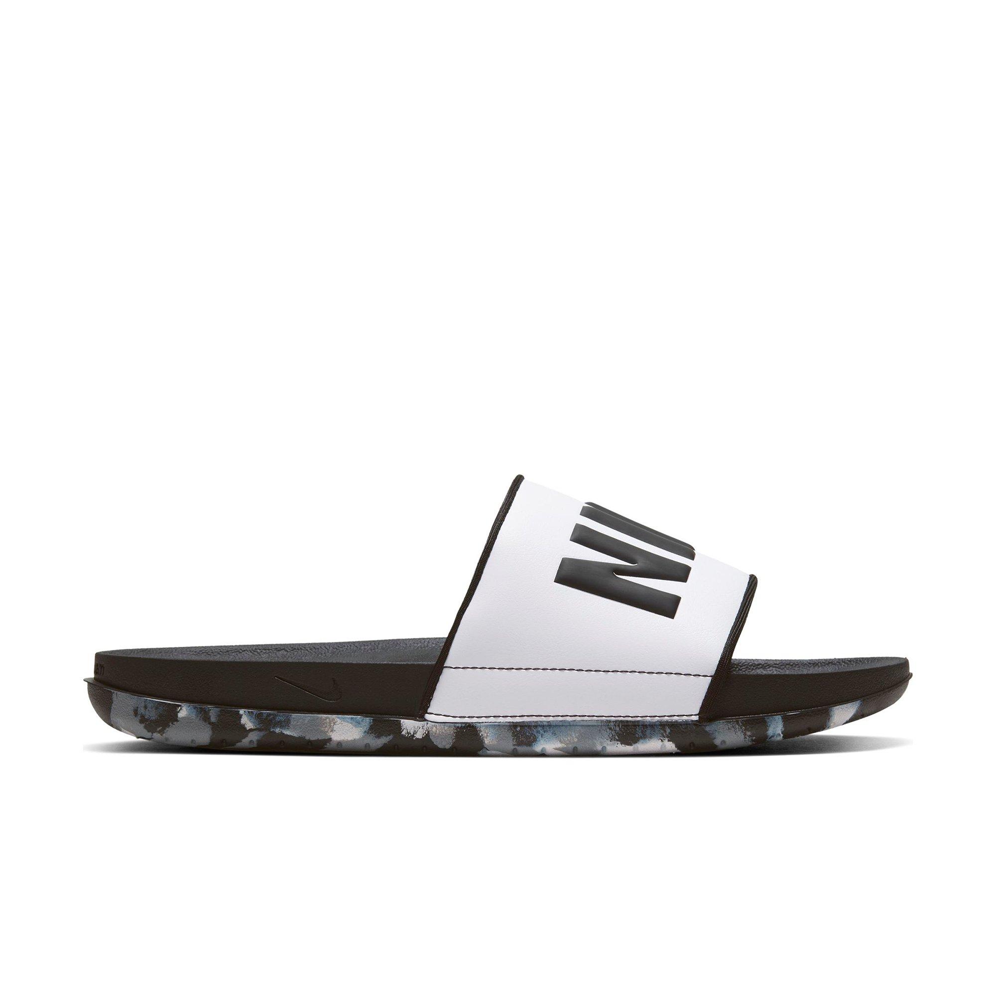 black and grey nike slides