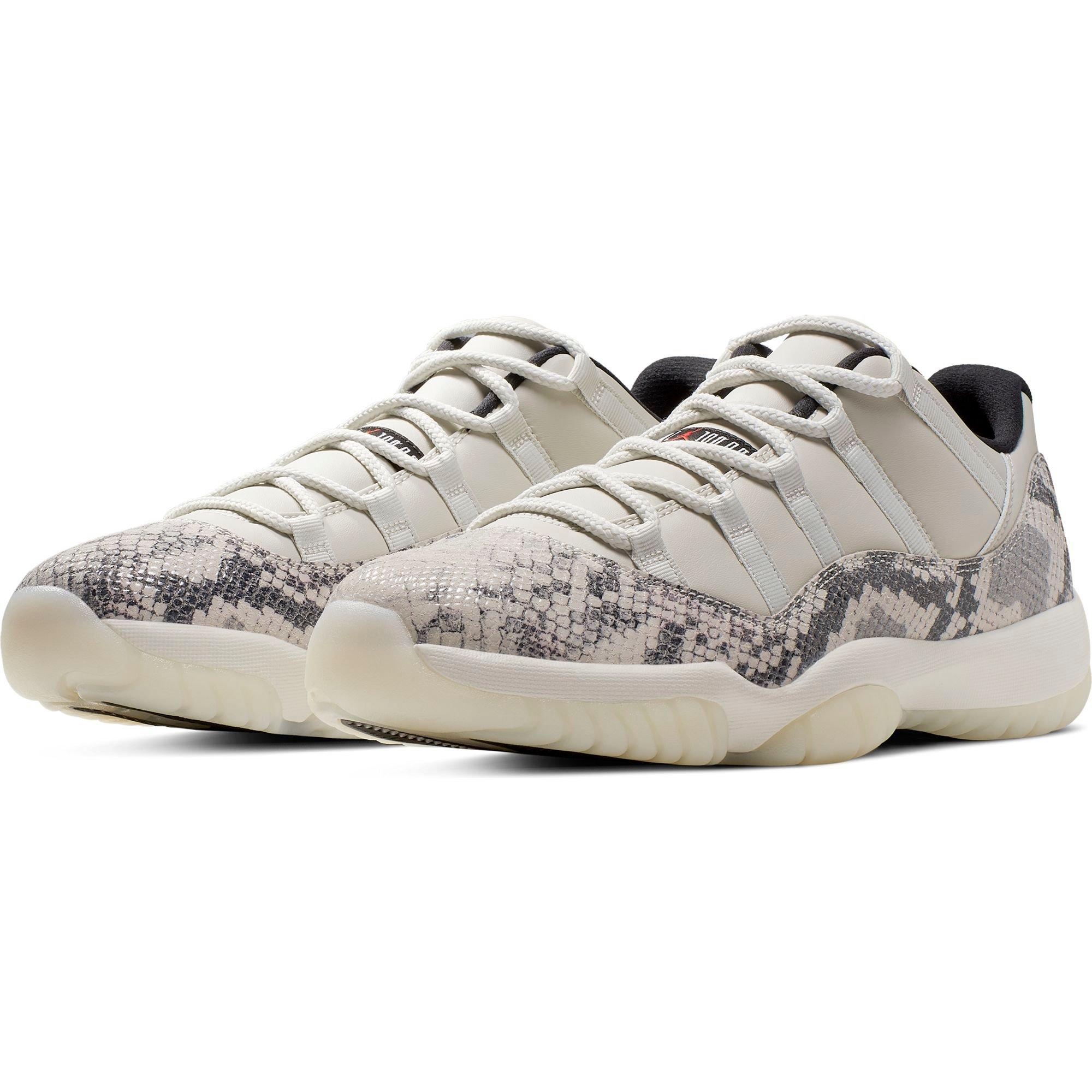 white and grey snakeskin 11s