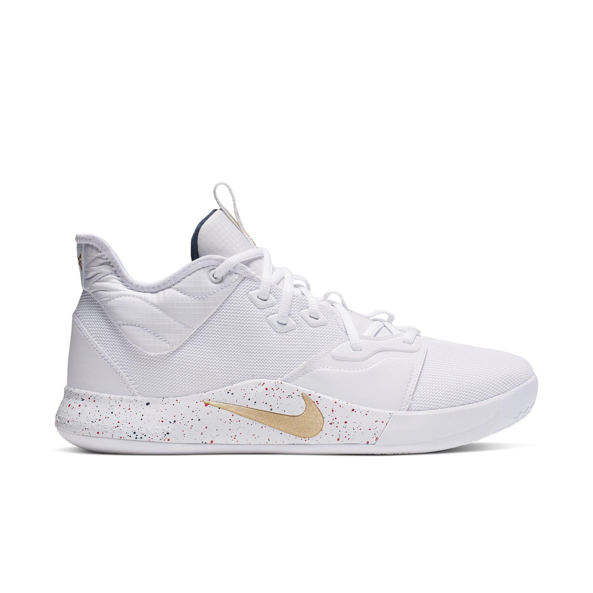 white and gold nike basketball shoes