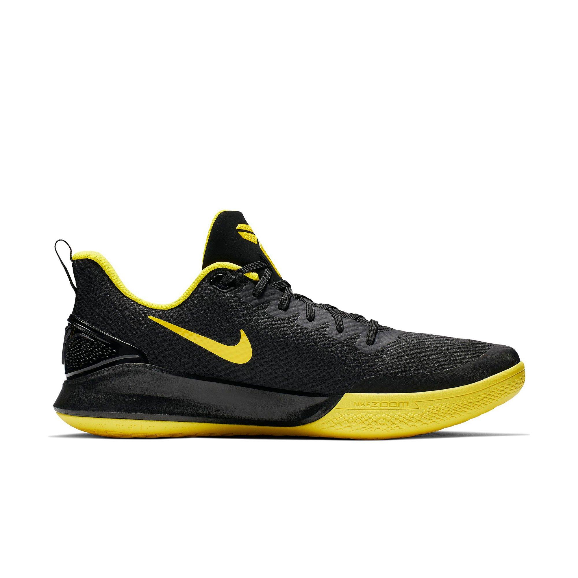 black yellow nike shoes