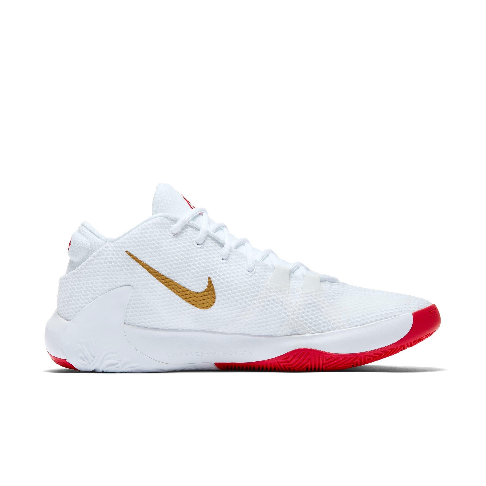 gold and white basketball shoes