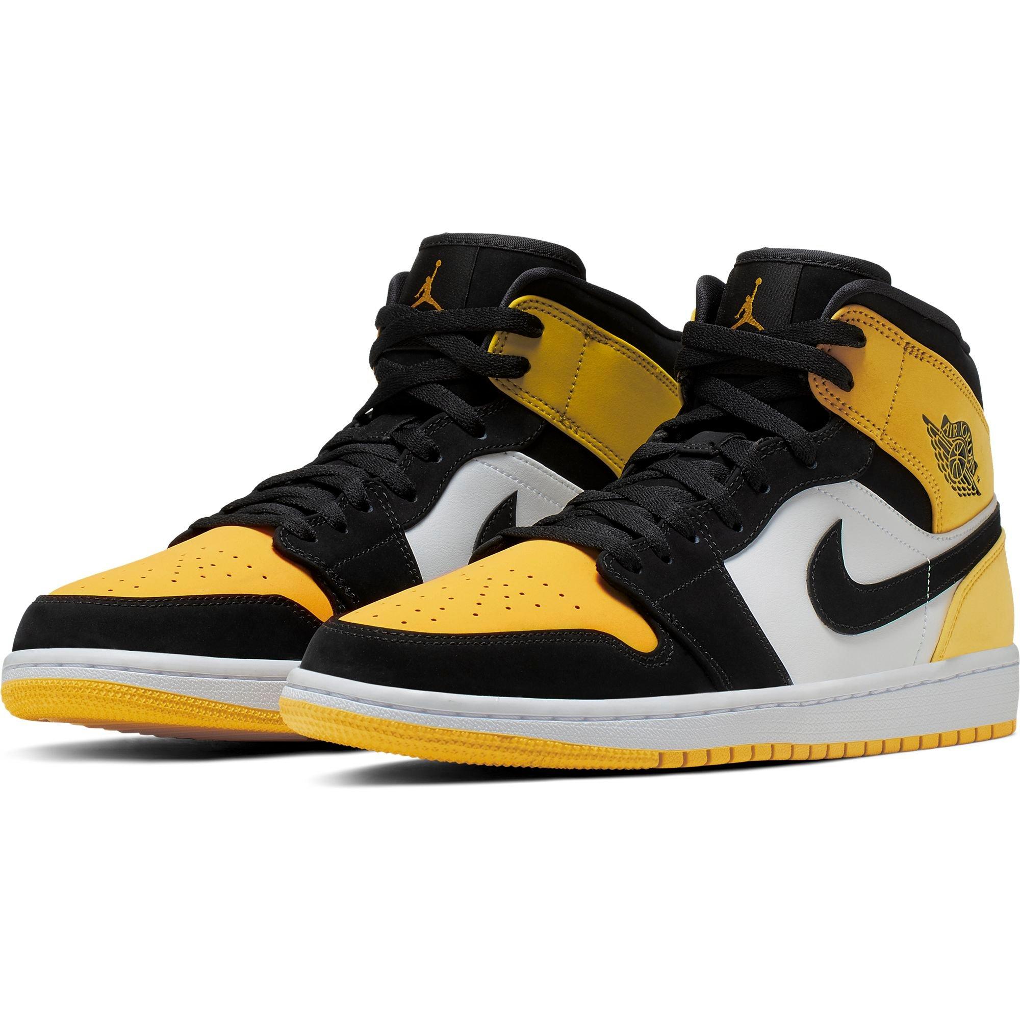 black and yellow jordan 1 mid