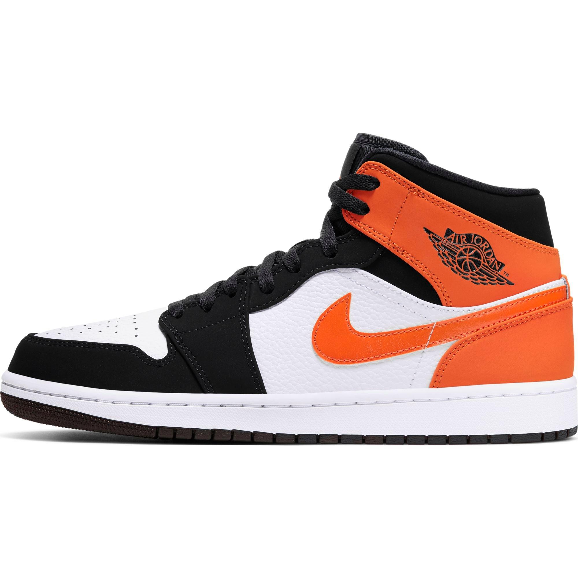 black orange and white jordan 1s