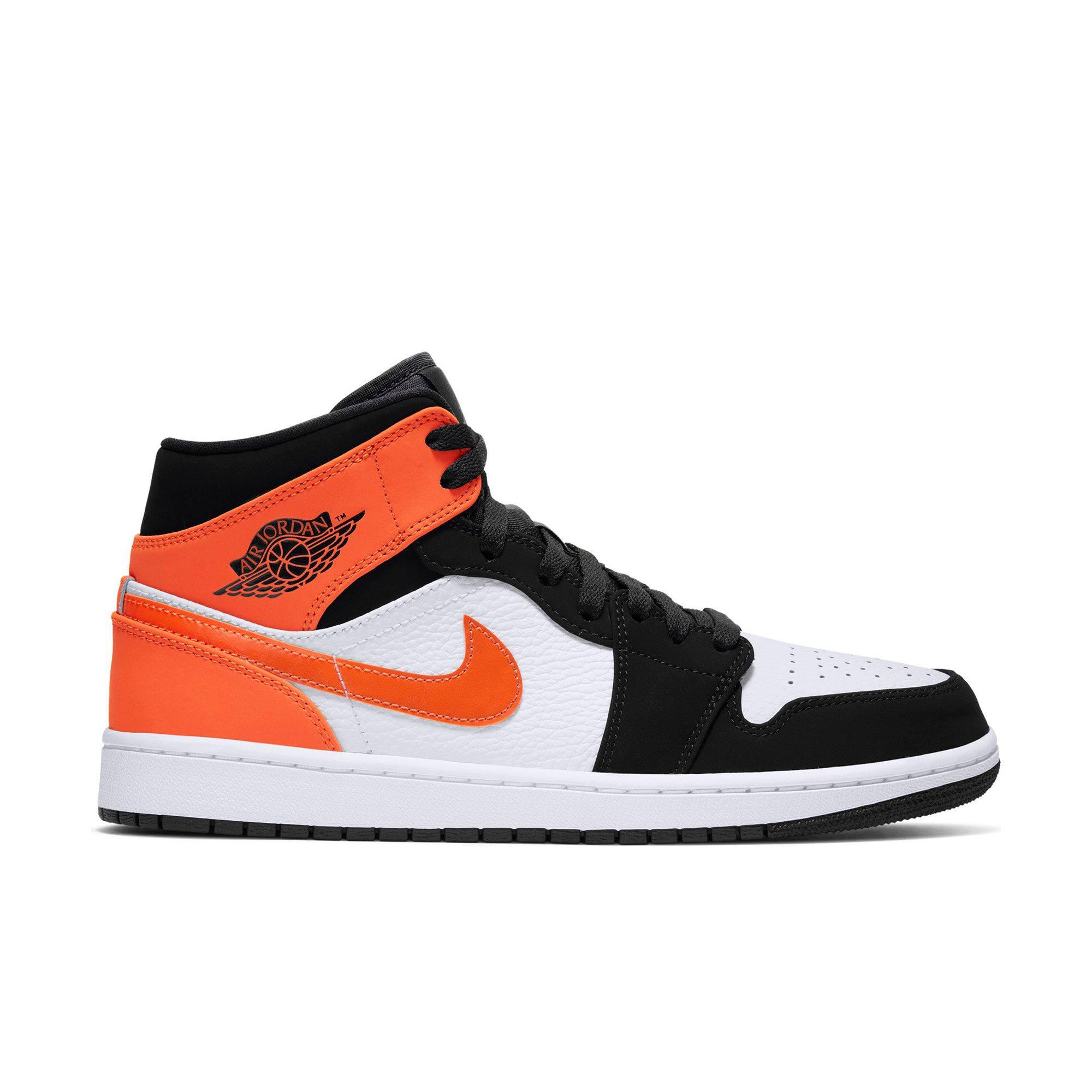 black orange and white jordans