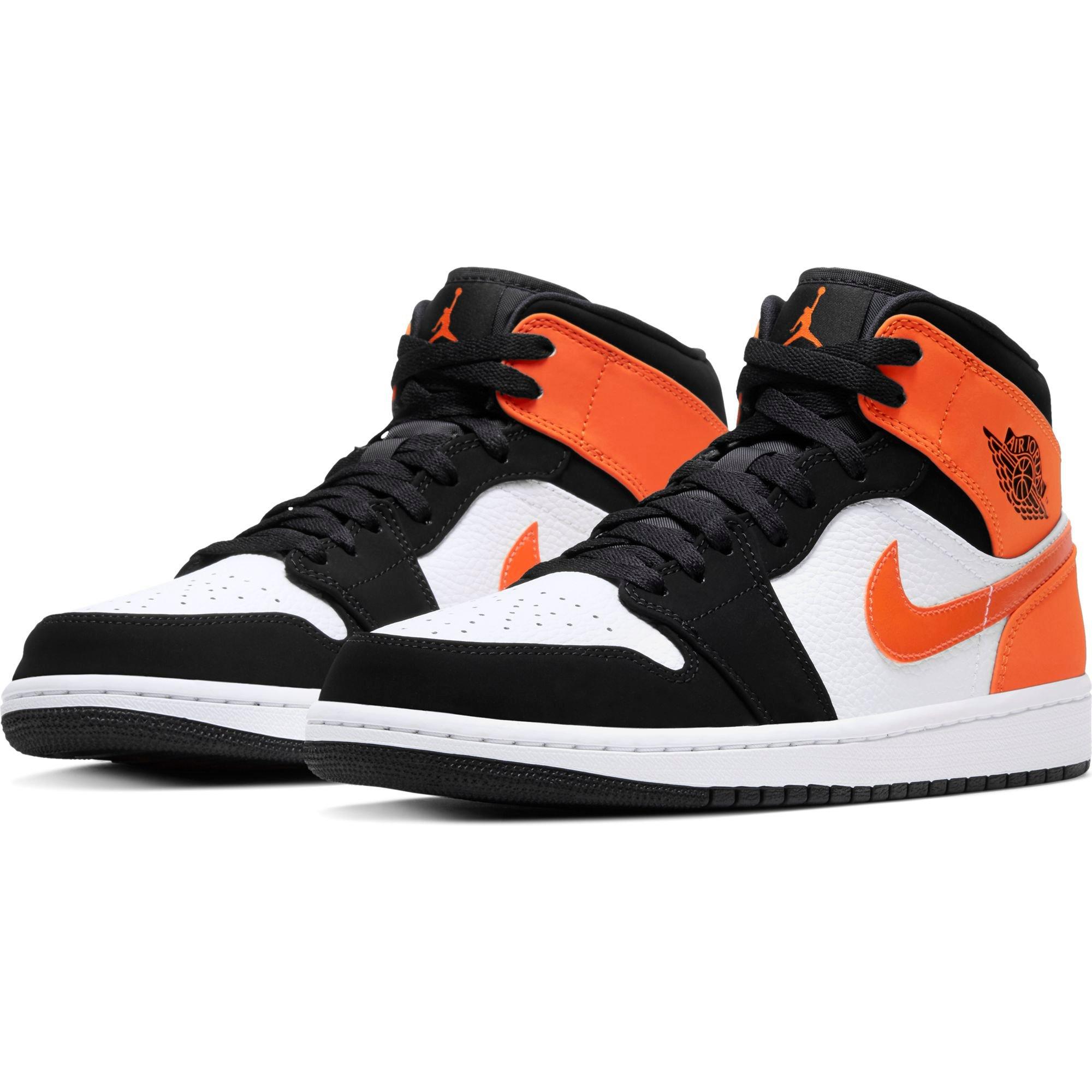 orange white and black jordan 1