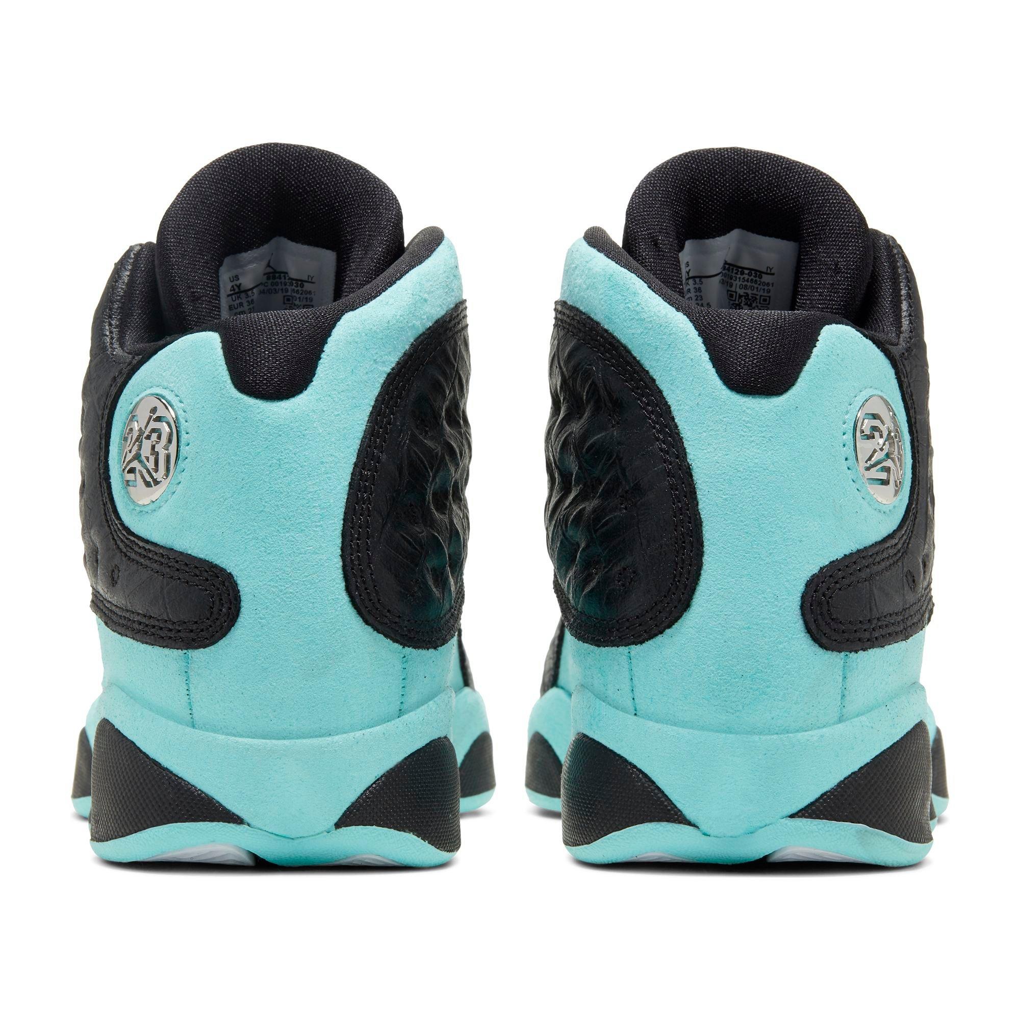 black and turquoise jordan 13