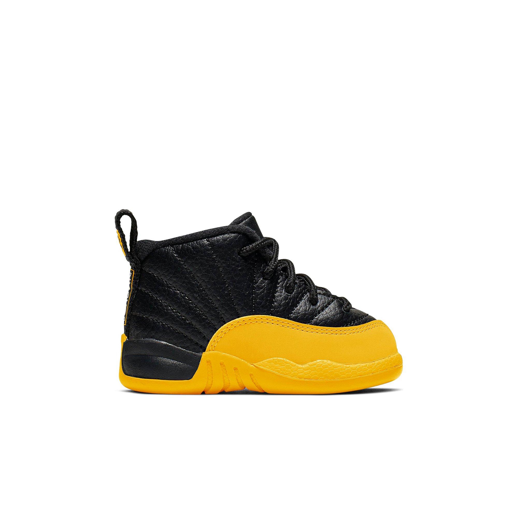 black and yellow infant jordans