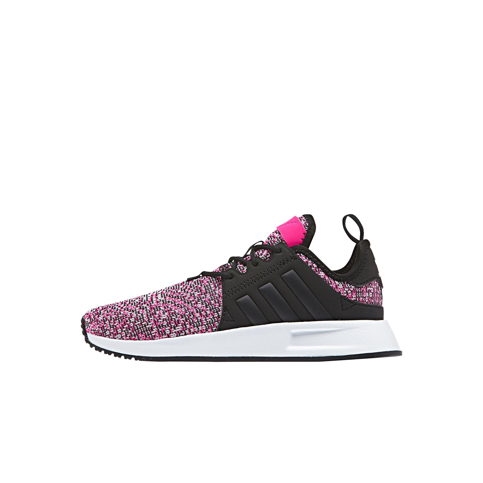 pink and black adidas sneakers
